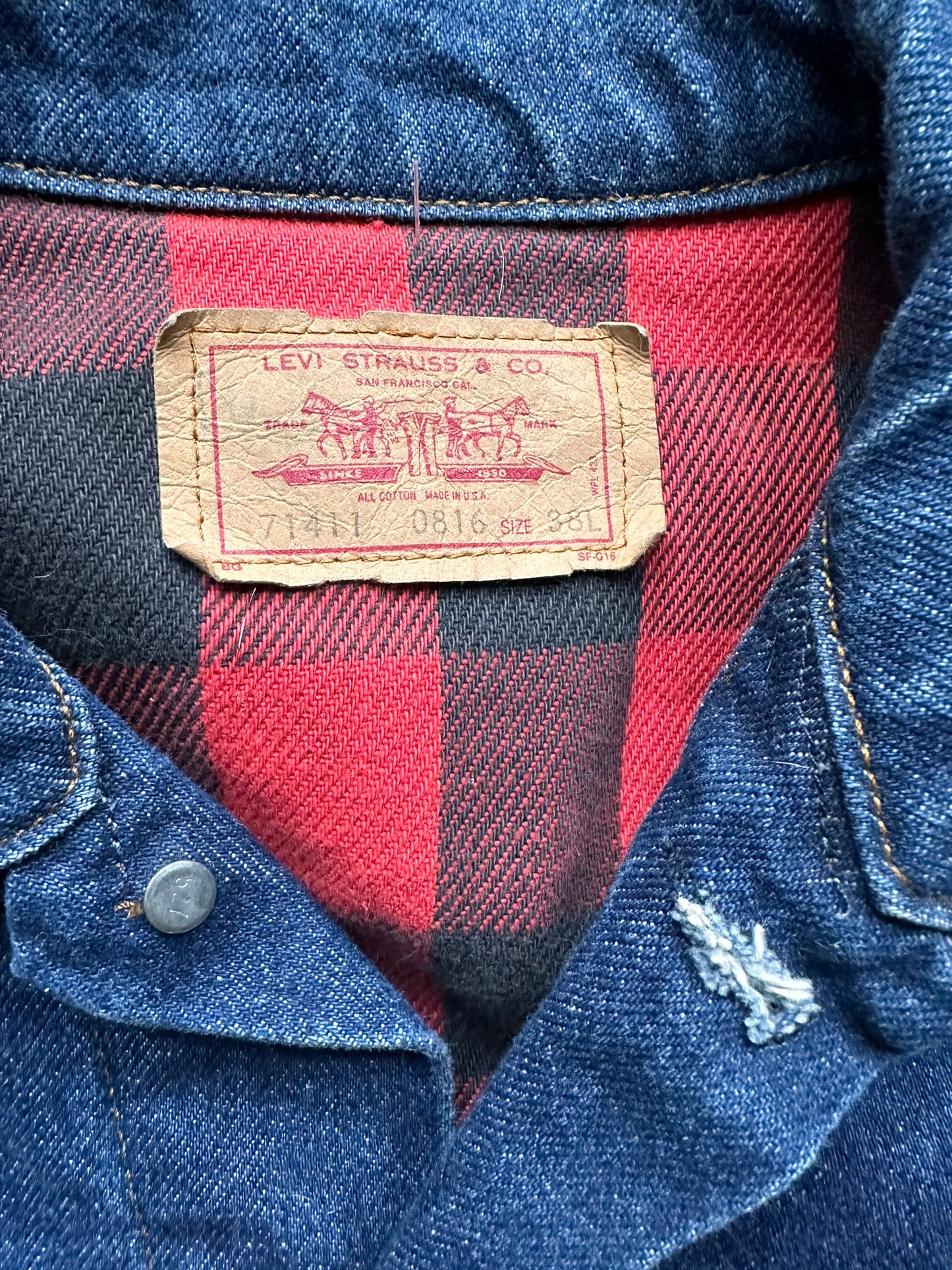 Tag Close Up of Vintage Red Flannel Lined Levis Type 3 Denim Trucker Jacket SZ S | Vintage Levi Strauss Denim Workwear Seattle | Seattle Vintage Clothing