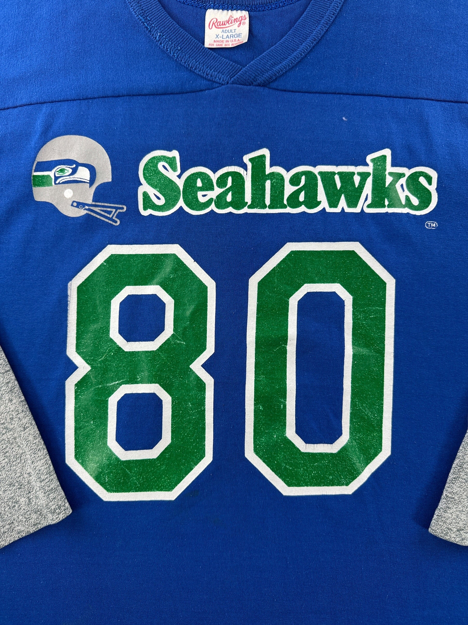 Front graphic of Vintage Rawlings Seahawks Steve Largent Jersey SZ XL (Fits L)