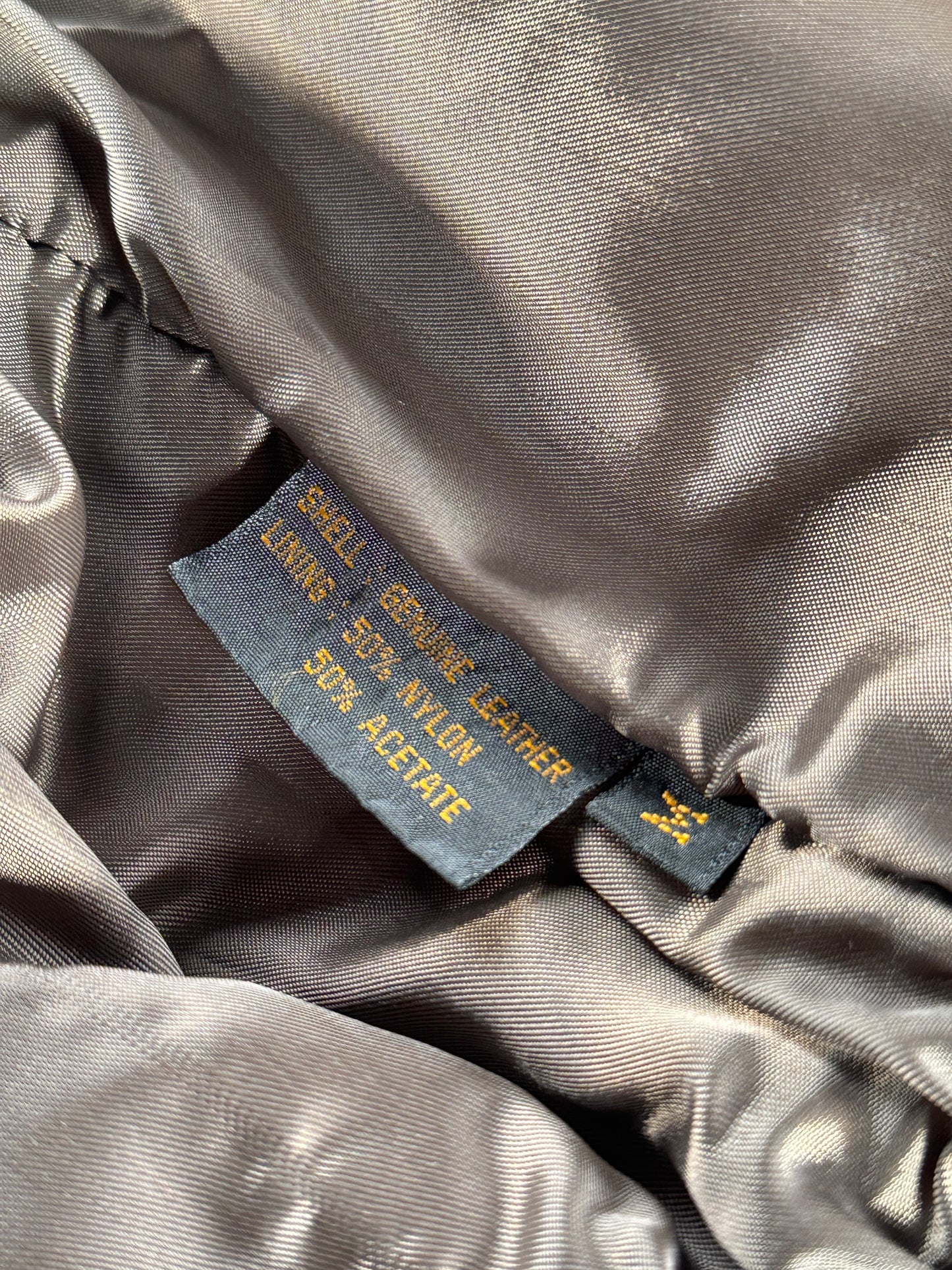Materials label on inside of Vintage 80s Double Breasted Leather Jacket SZ M