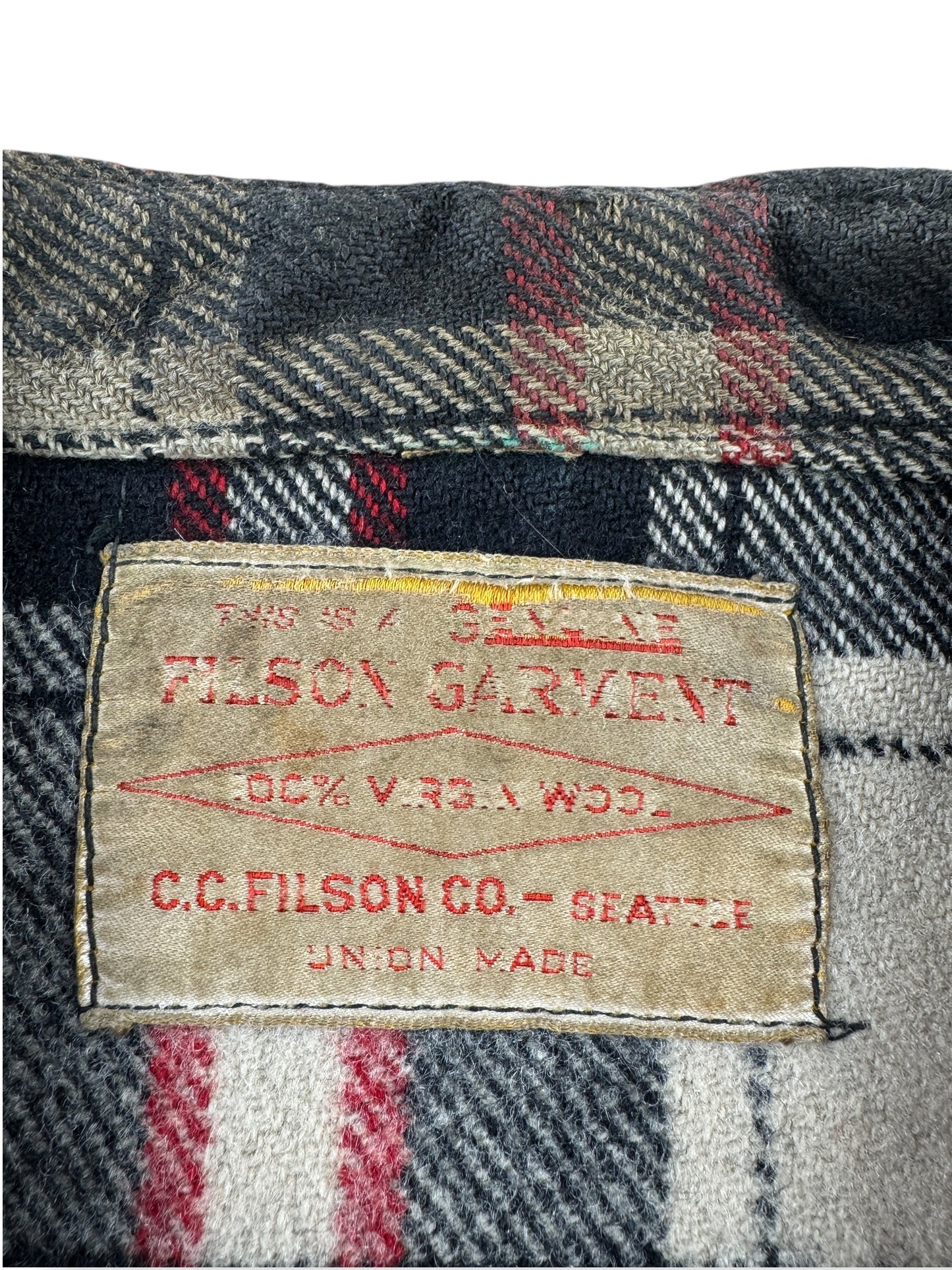 Label on Vintage 1951 Filson Black-Red-White Dark Side Peppermint Patty SZ XL