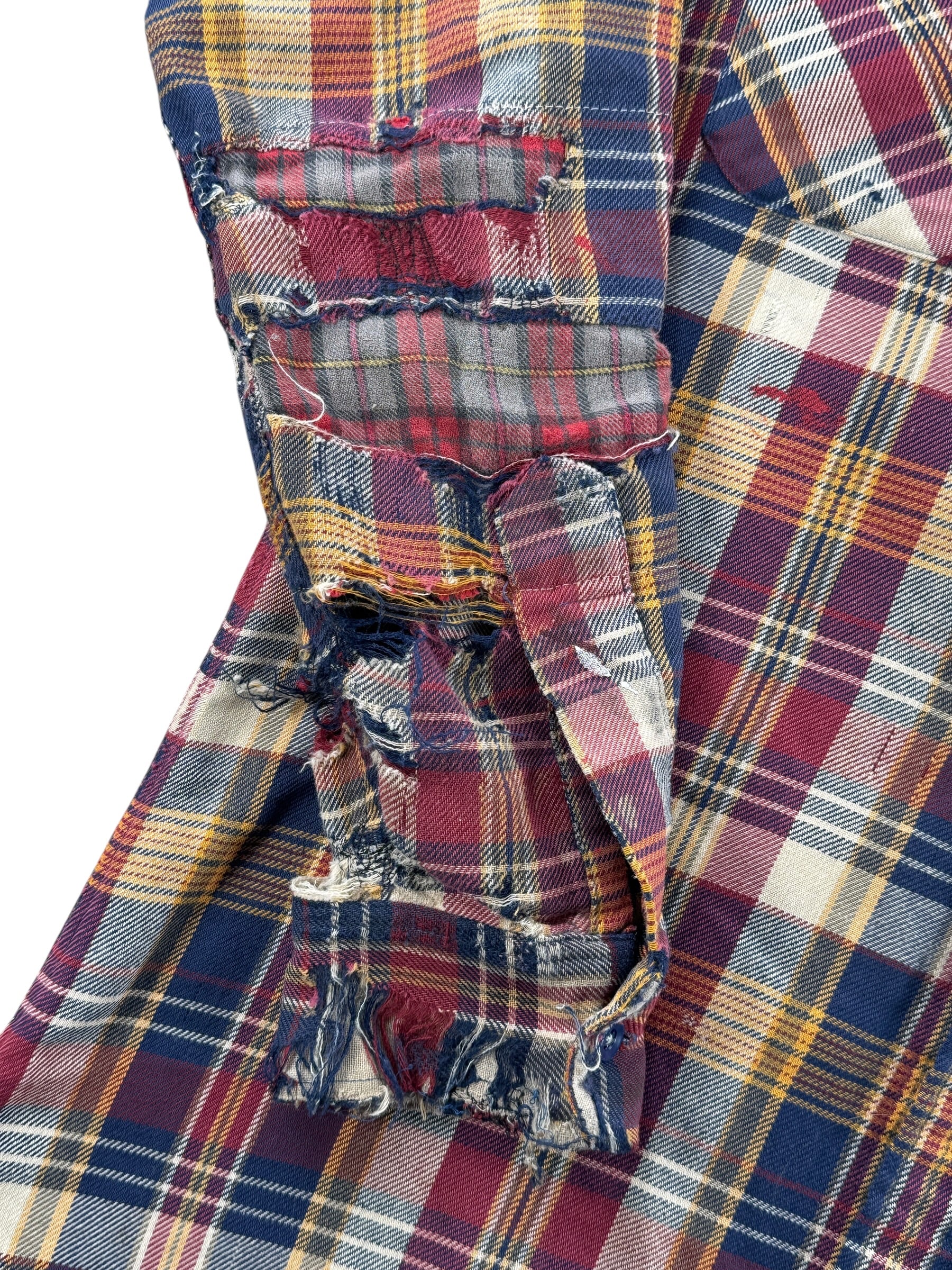 Damage and repairs on sleeve of Vintage Thrashed 80's JC Penney Flannel SZ M