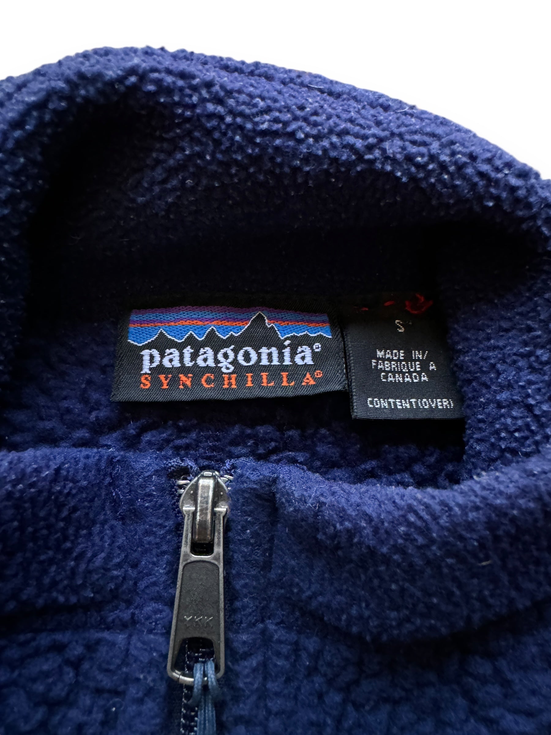 tag on Vintage Patagonia Navy Synchilla Fleece SZ S