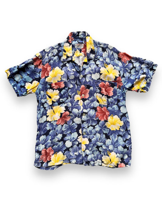 front of Vintage Made in Japan Blue/Yellow/Mauve Floral Penney's Aloha Shirt SZ M