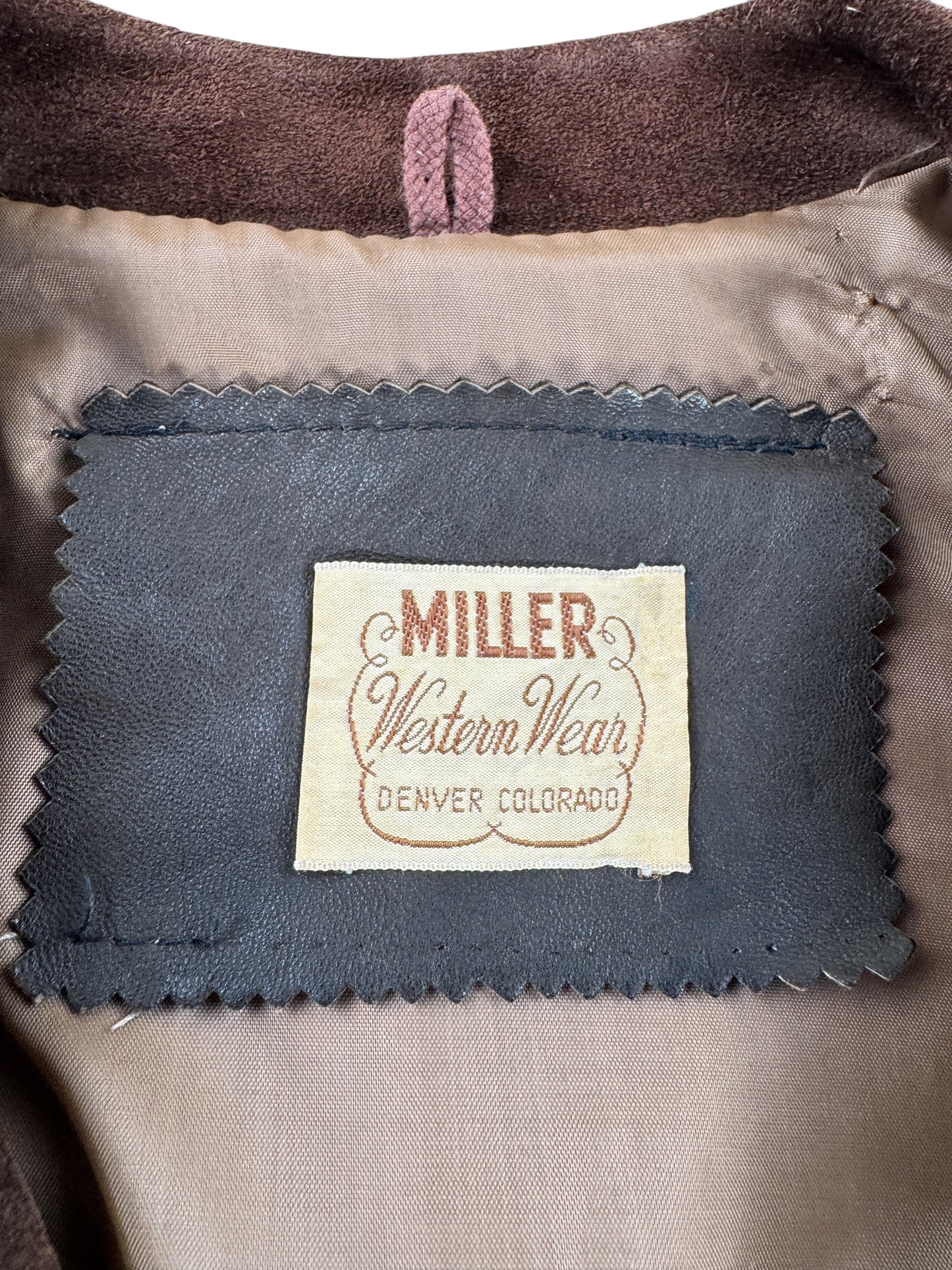 Label on Vintage Miller Western Wear Dark Brown Suede Fringe Jacket SZ L