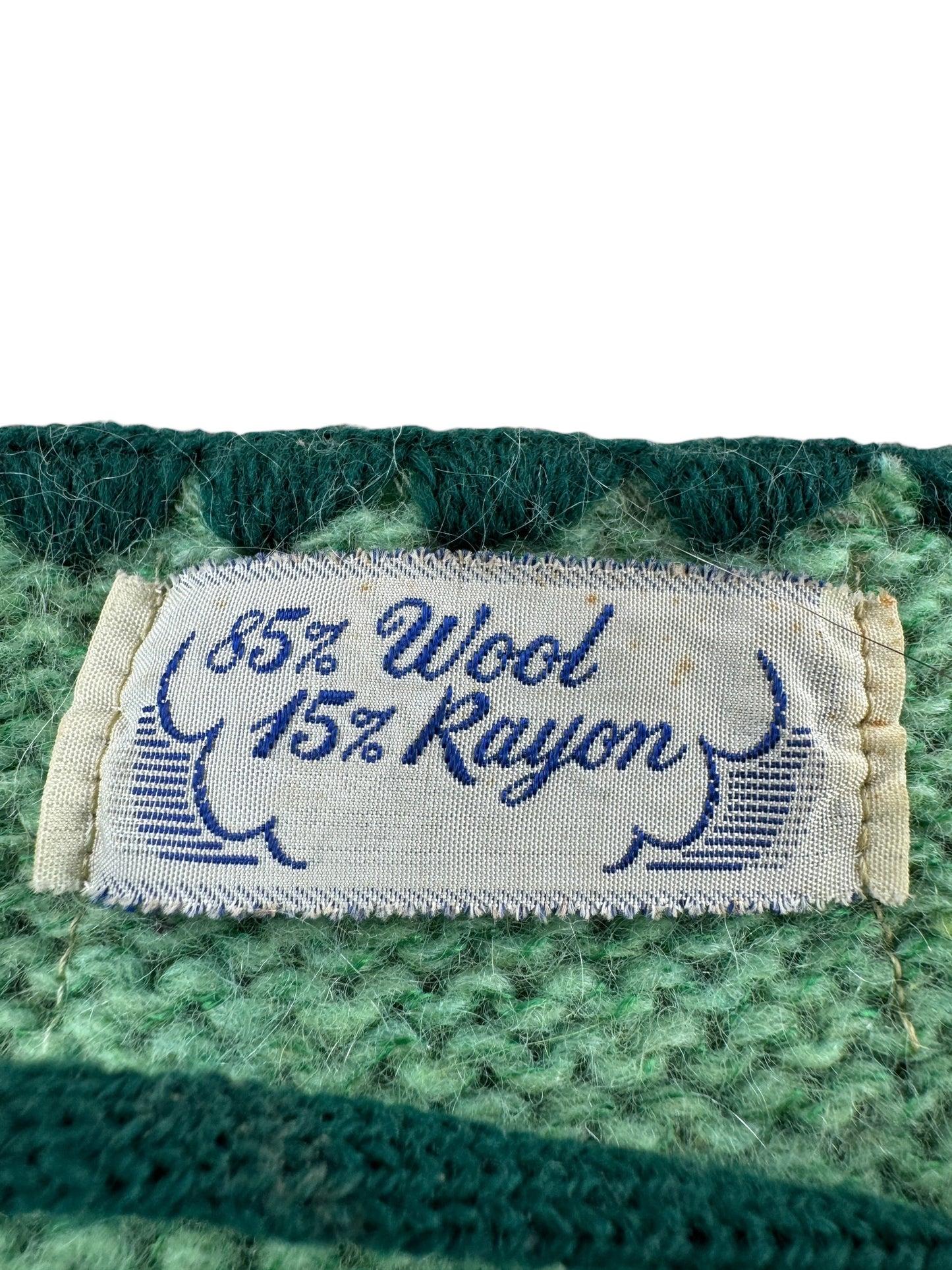 Label on Vintage Wool Rayon Blend Green Knit Sweater SZ M