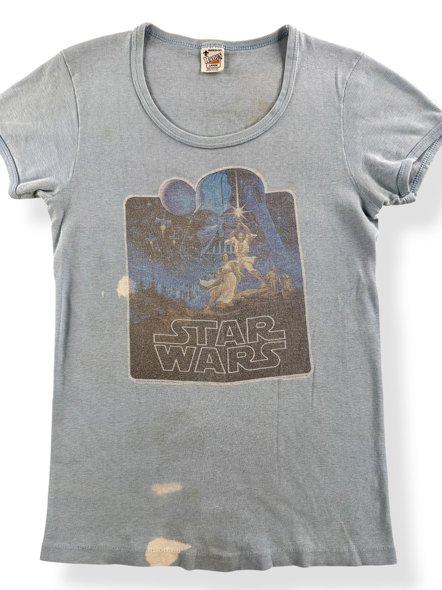 Close-up of Vintage Star Wars Baby Tee SZ XXS - AS IS