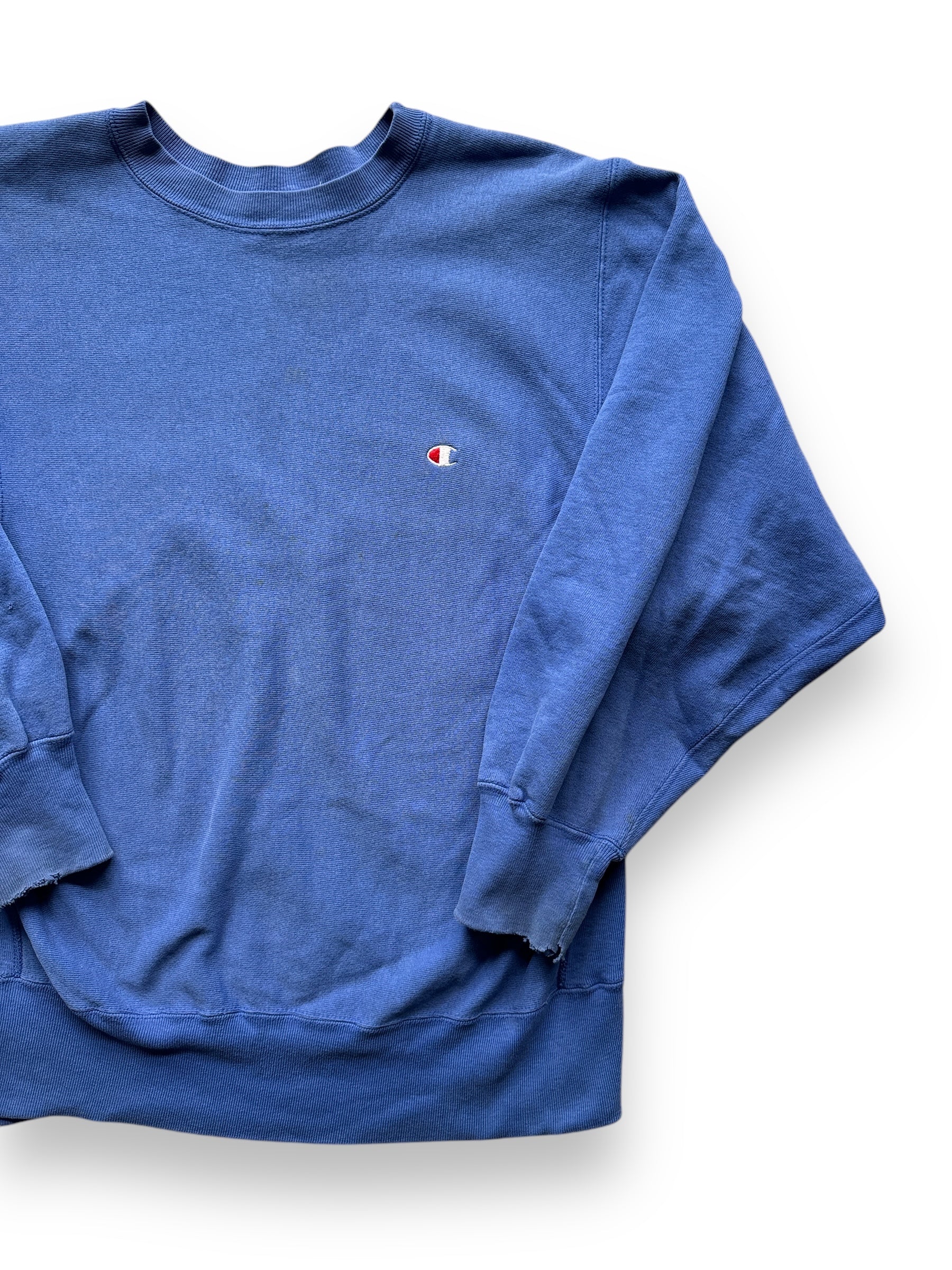 front left of Vintage Blue Blank Champion Reverse Weave Crewneck SZ L