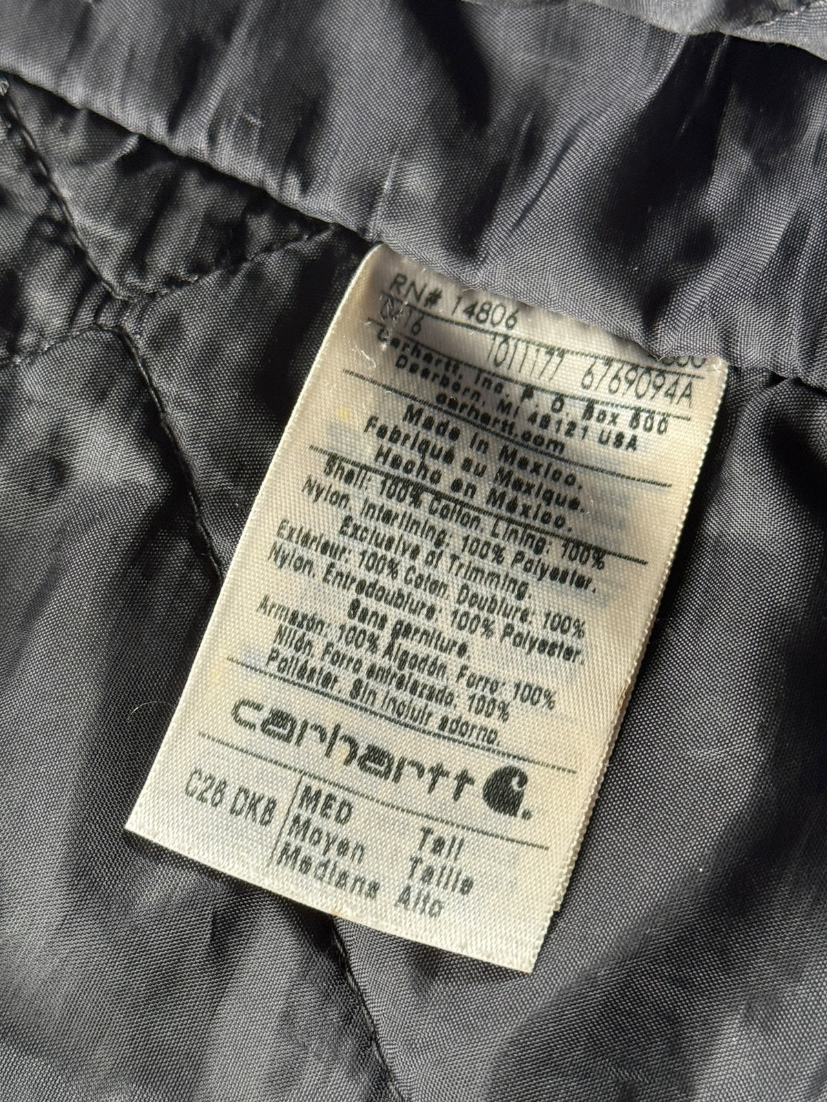 Inner tag on Vintage Carhartt Arctic Jacket Faded Brown SZ M-T