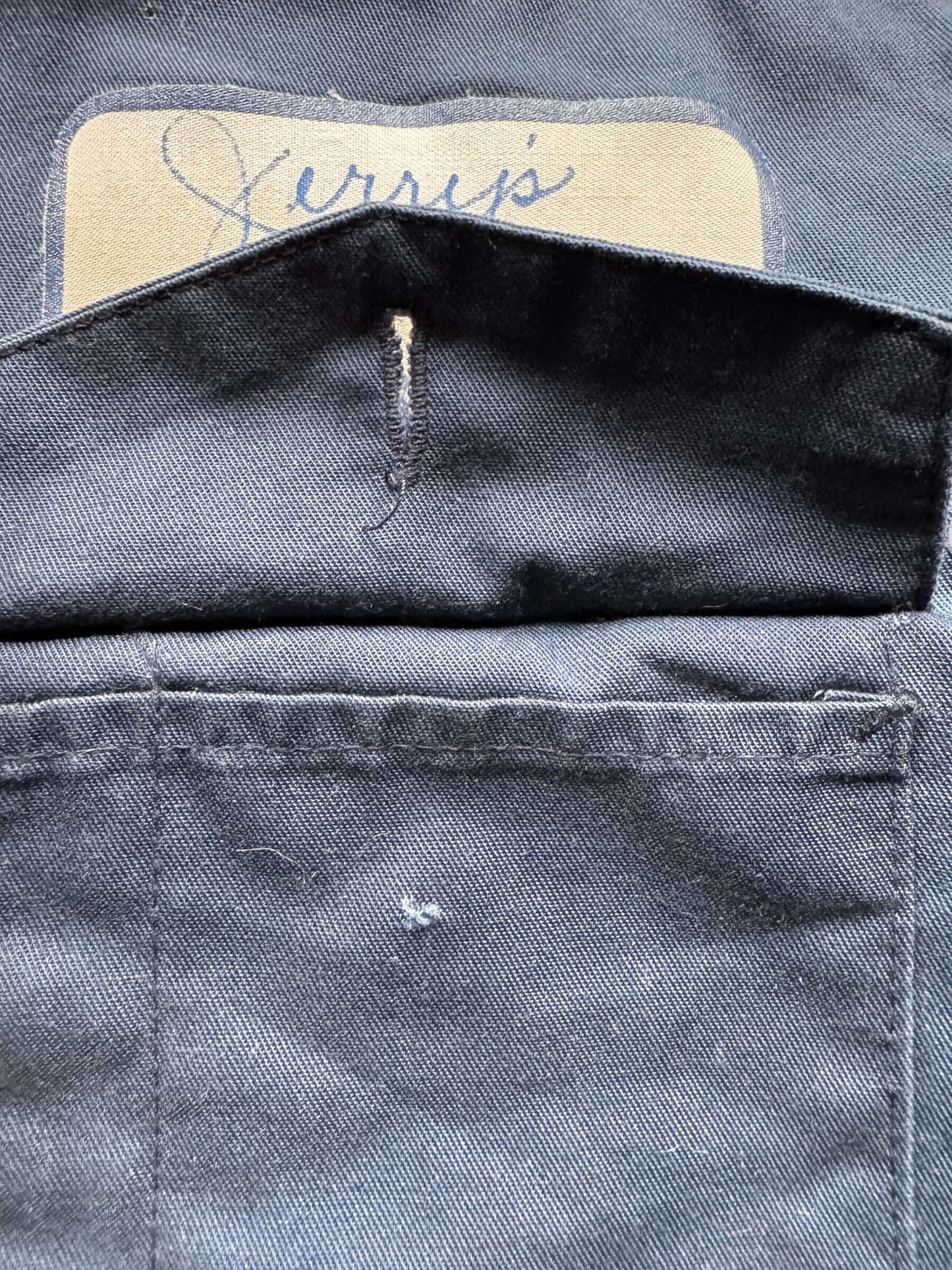 missing button on left breast pocket on Vintage Distressed Jerry's Muffler Shop Quilt Lined Jacket SZ M