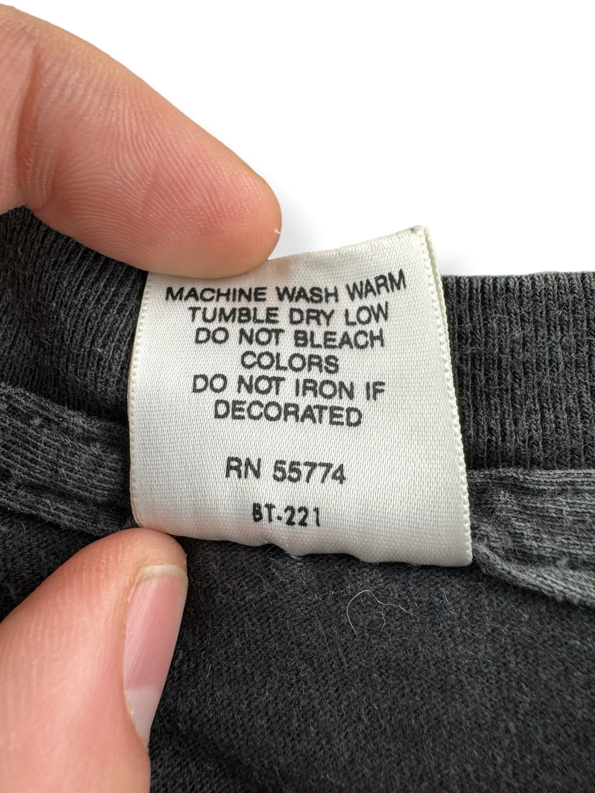 Back of tag on Vintage 90s Fluid Volume Is Job 1 Tee SZ XL