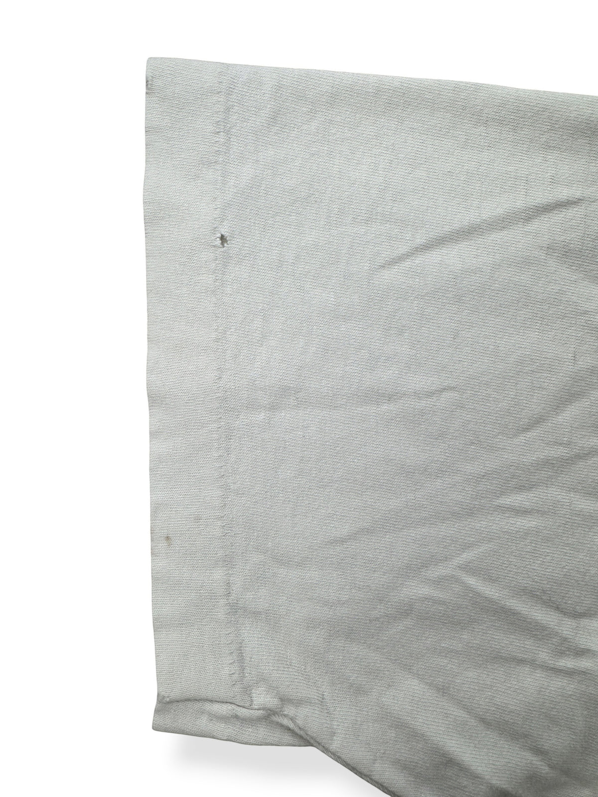 Small holes on back of sleeve of Vintage Thrashed Give Racism The Boot Timberland Tee SZ XL