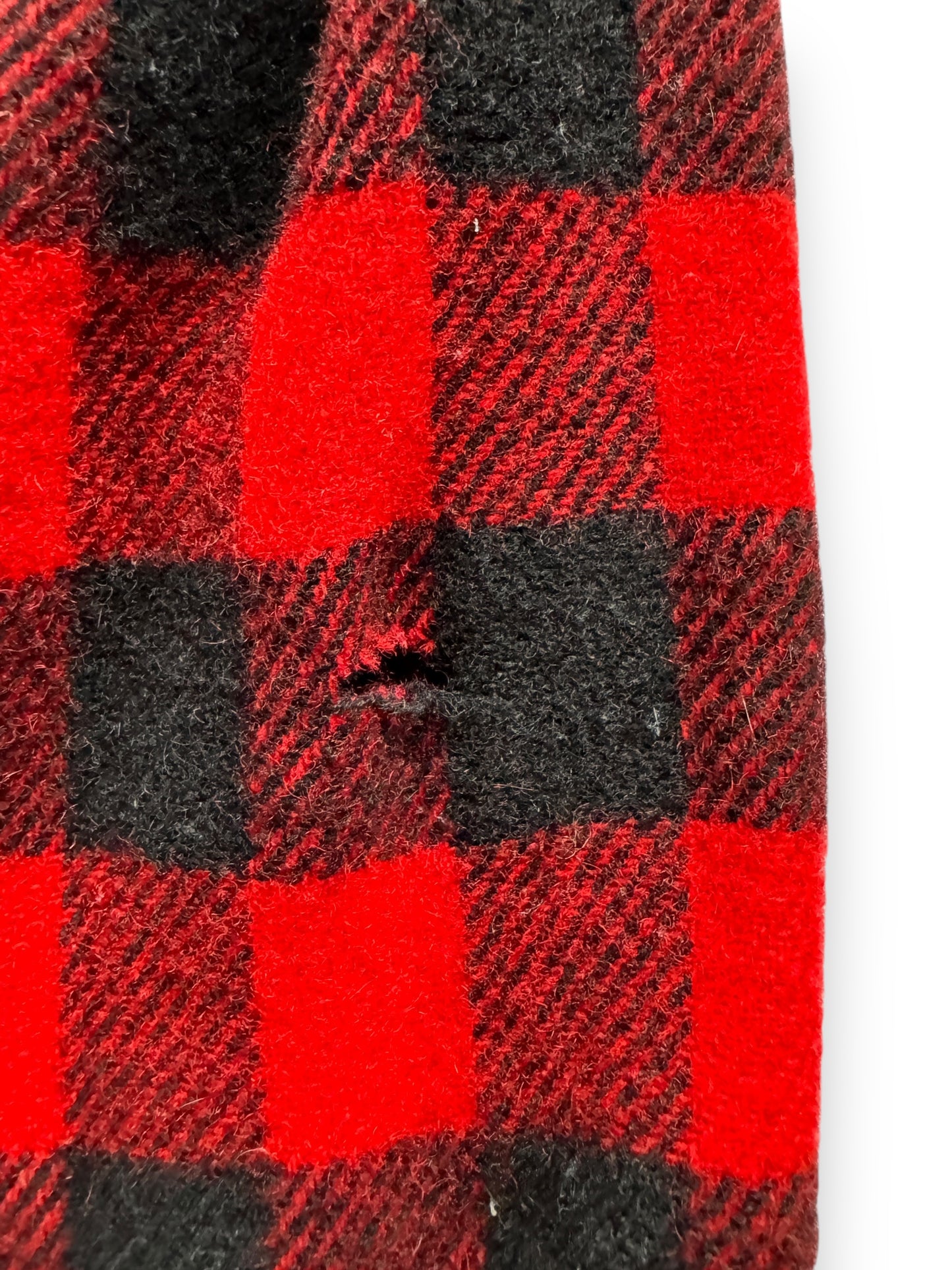 hole on left sleeve of Vintage Woolrich Buffalo Plaid Wool Flannel SZ S