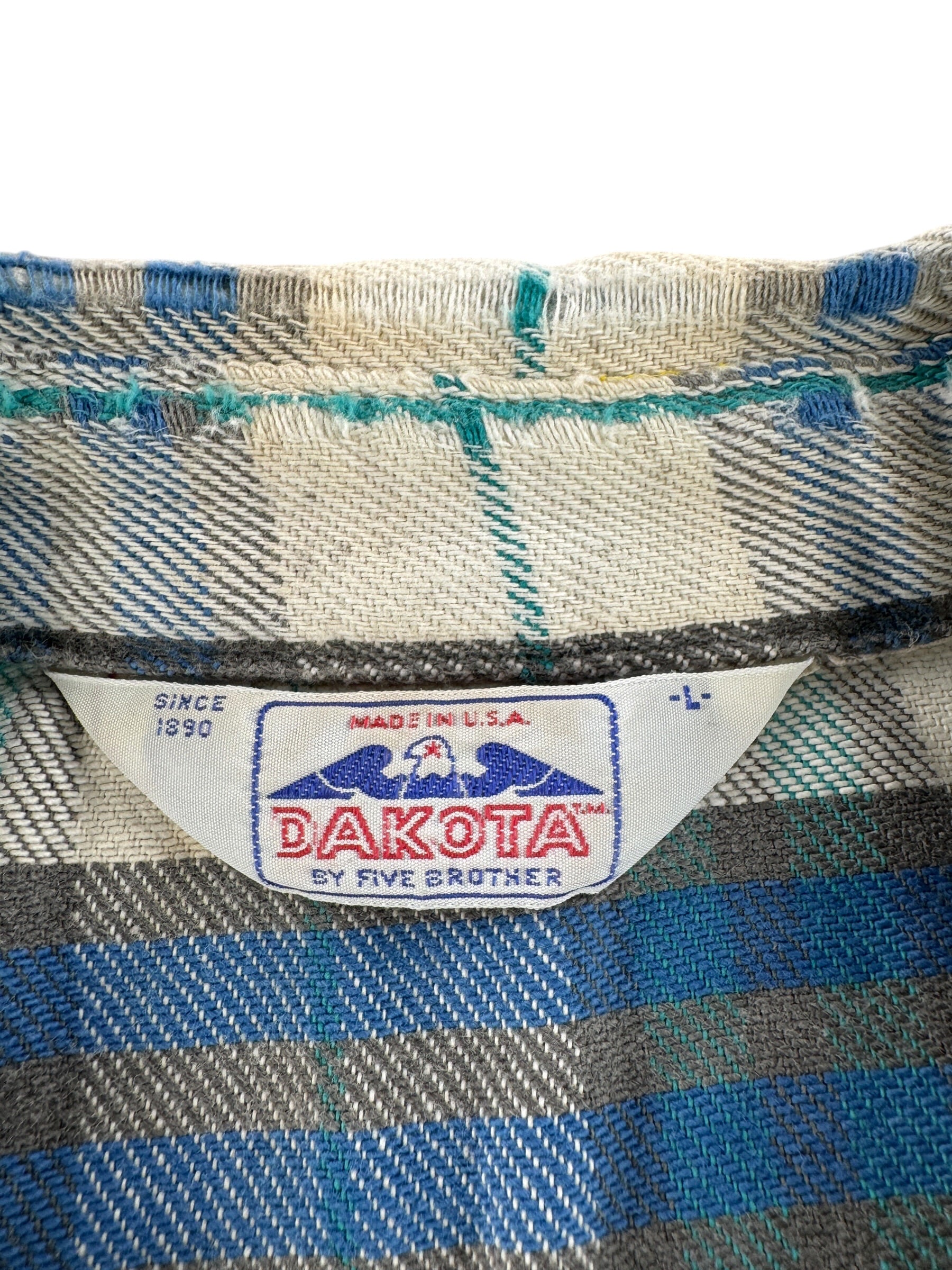 Label on Vintage 80s Thrashy Pearl Snap Flannel SZ L