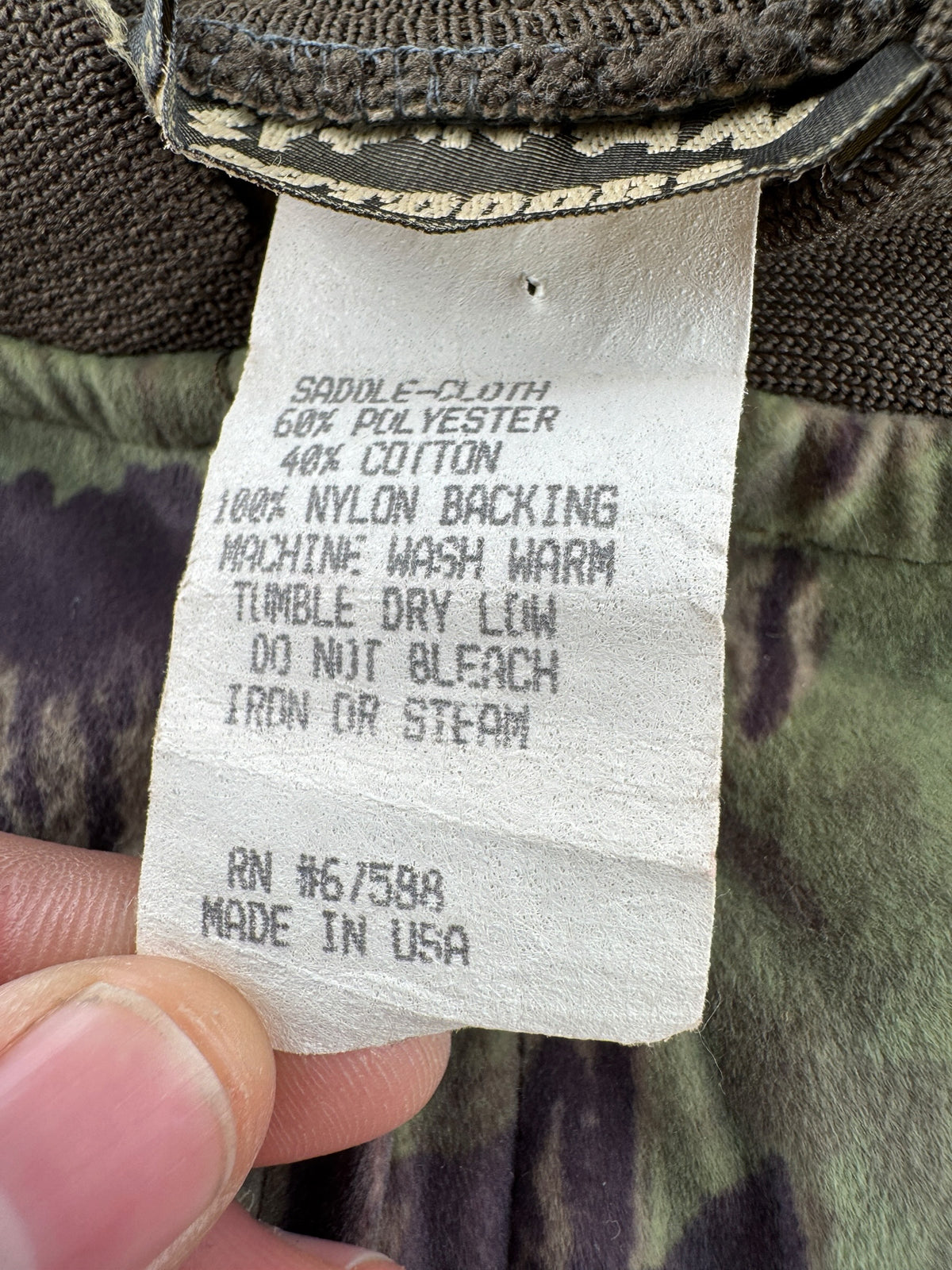 Care tag on Vintage Realtree Camo Bomber Jacket SZ XL