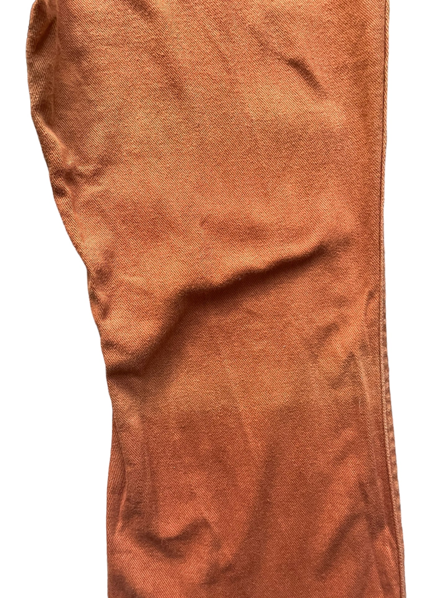 Back right leg fading view of Vintage 1970s Rusty Orange Bells W30 | Barn Owl Vintage Seattle | Vintage Pants and Denim