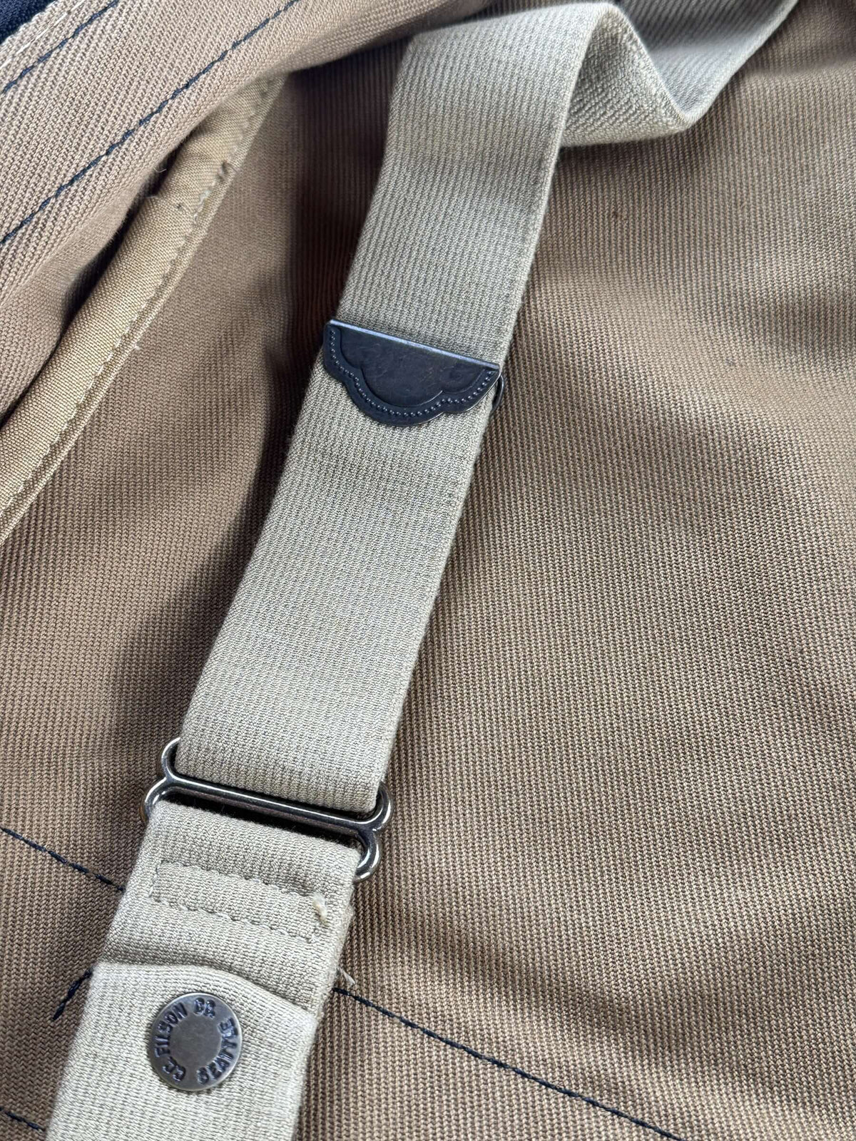Straps on inside of Filson Rugged Twill Pullman Bag NWOT