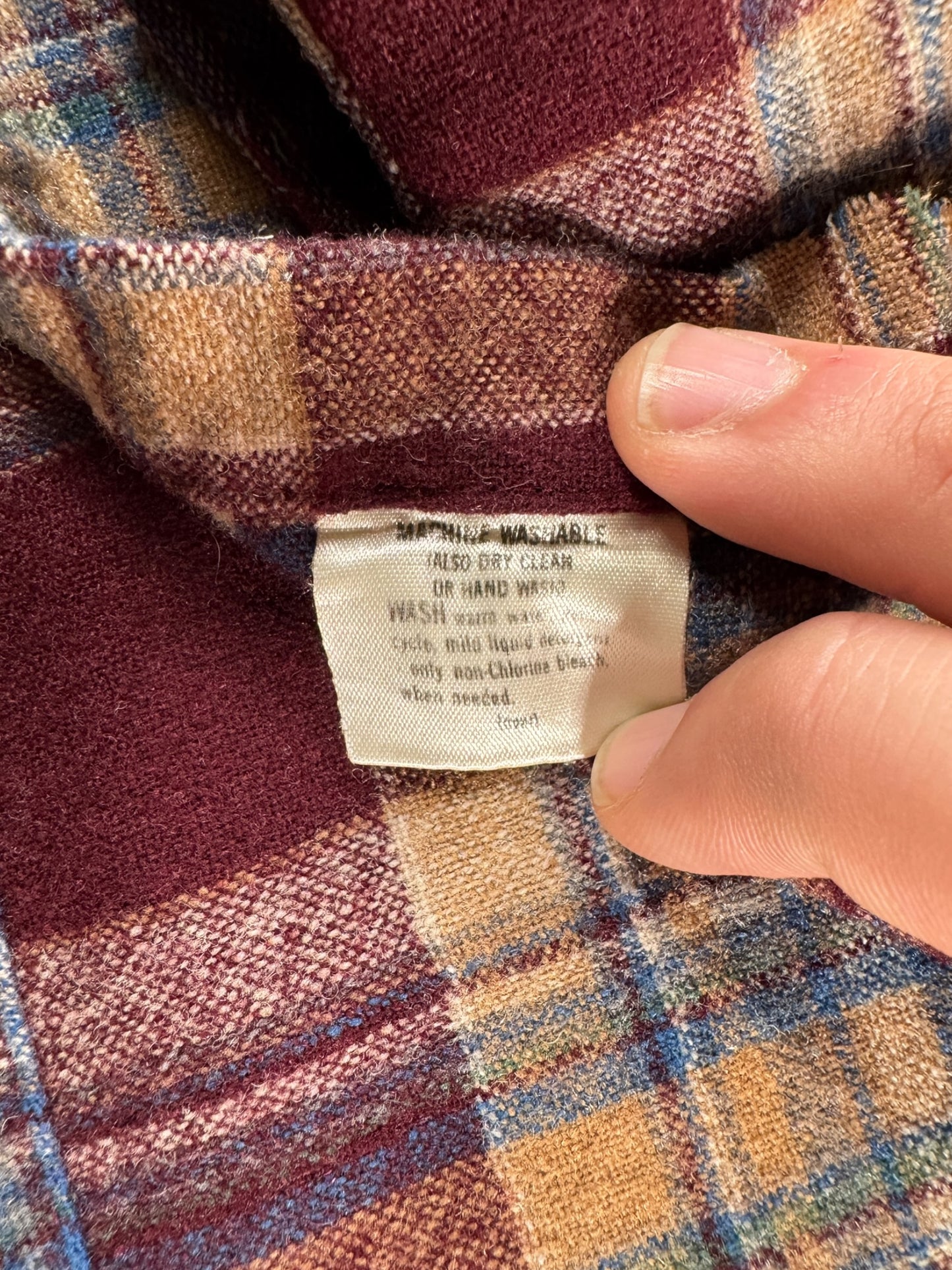 Front of care tag on Vintage Pendleton Burgundy Board Shirt SZ L