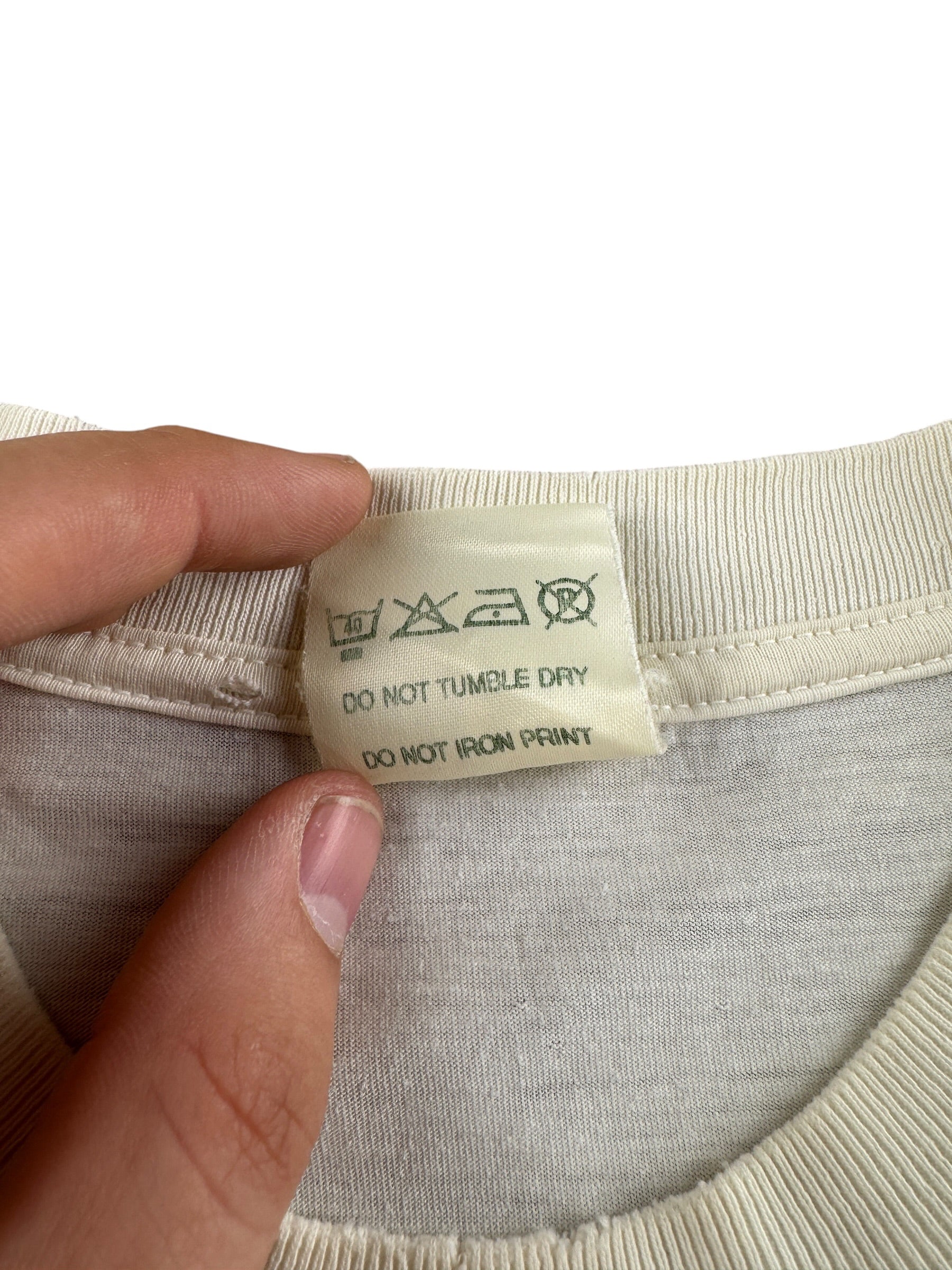 Other side of tag on Vintage Greenpeace Tee SZ XL