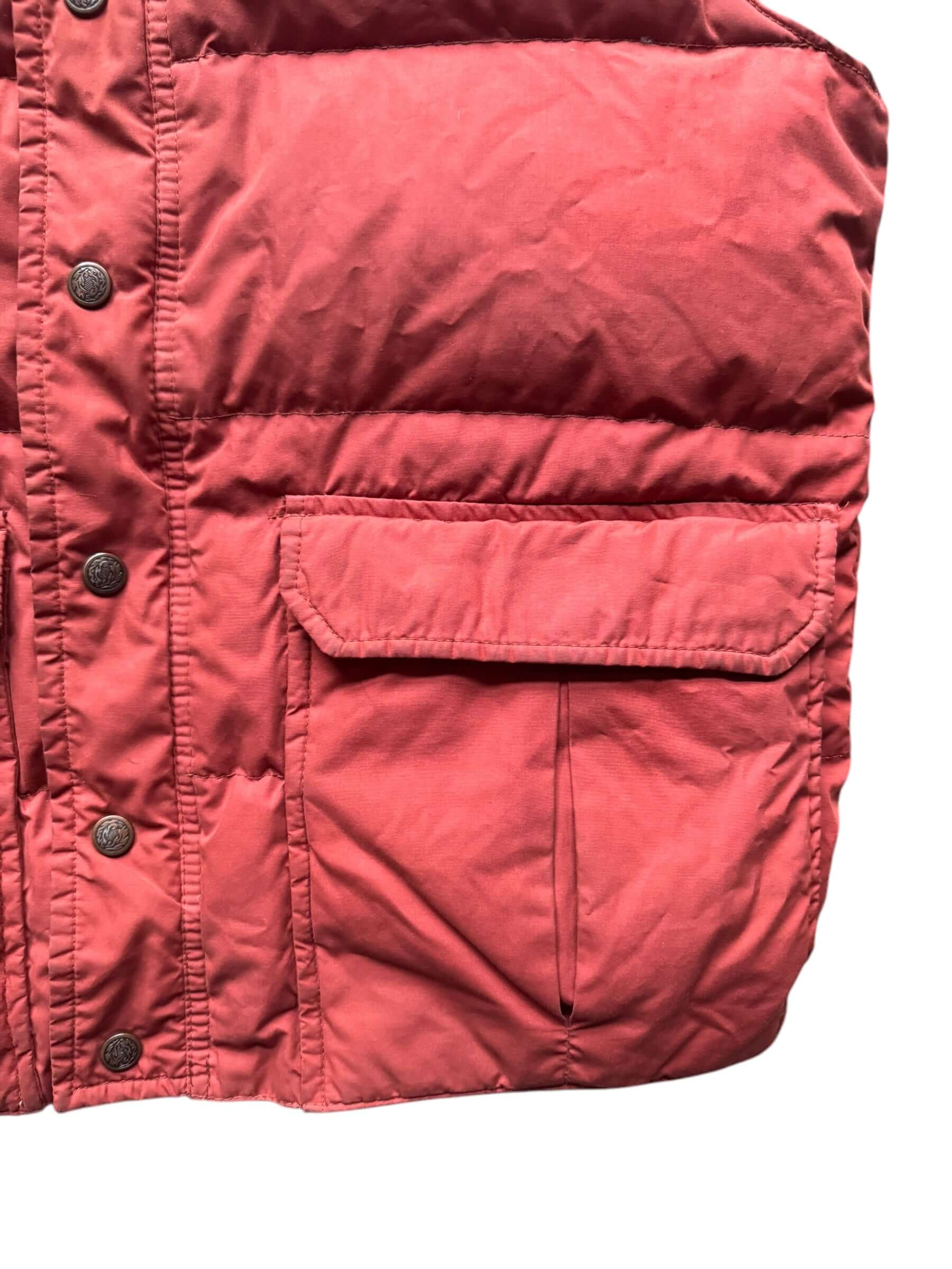 Front left bottom of 1970s Sears Burnt Orange Puffer Vest L