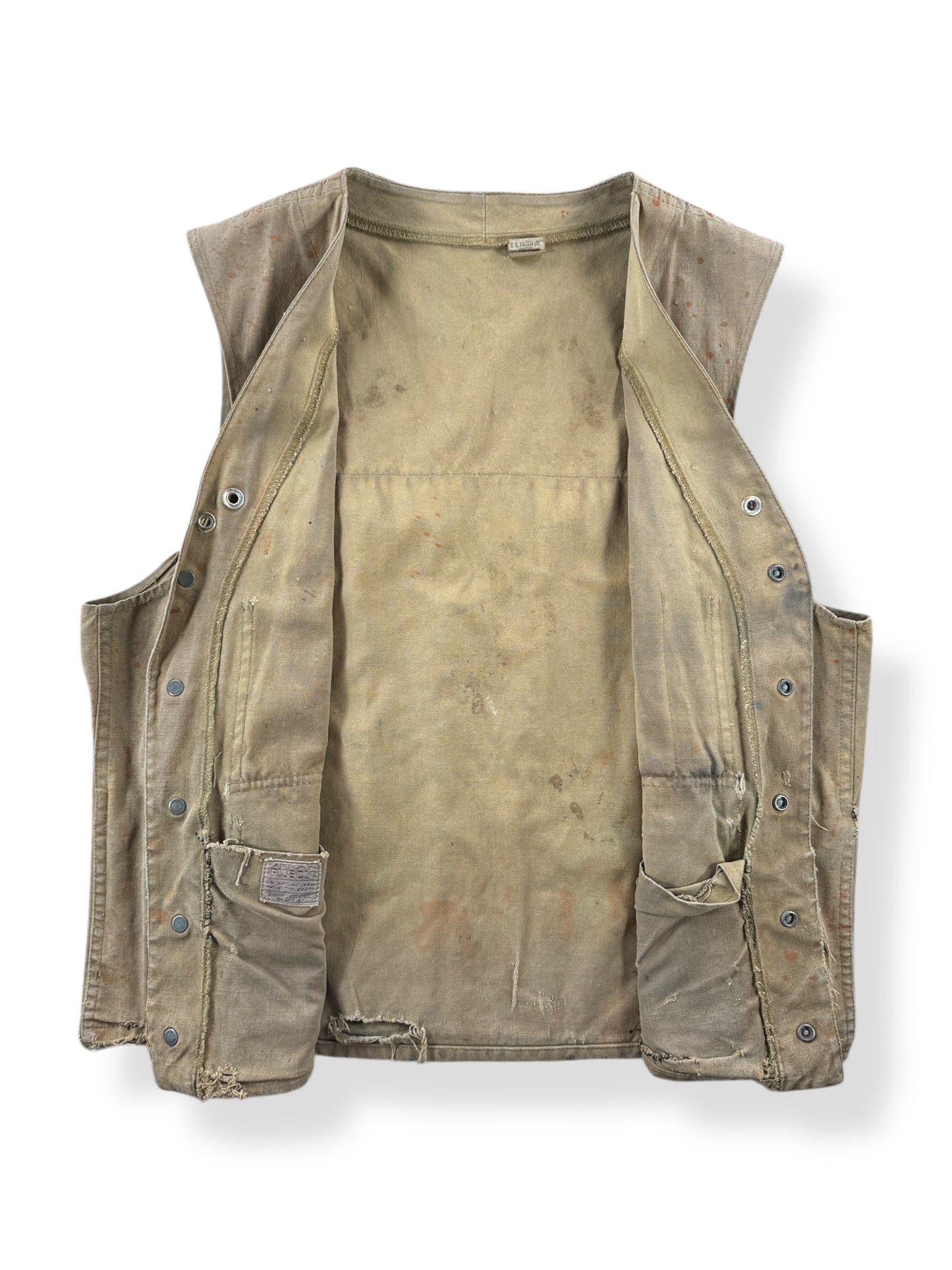 Inside of Vintage Filson Tin Hunting Vest Button Sample SZ 40