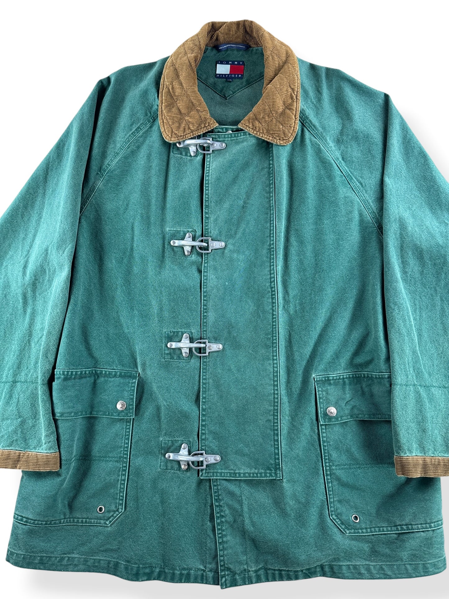Close up of Vintage Tommy Hilfiger Fireman Clasp Canvas Coat SZ L