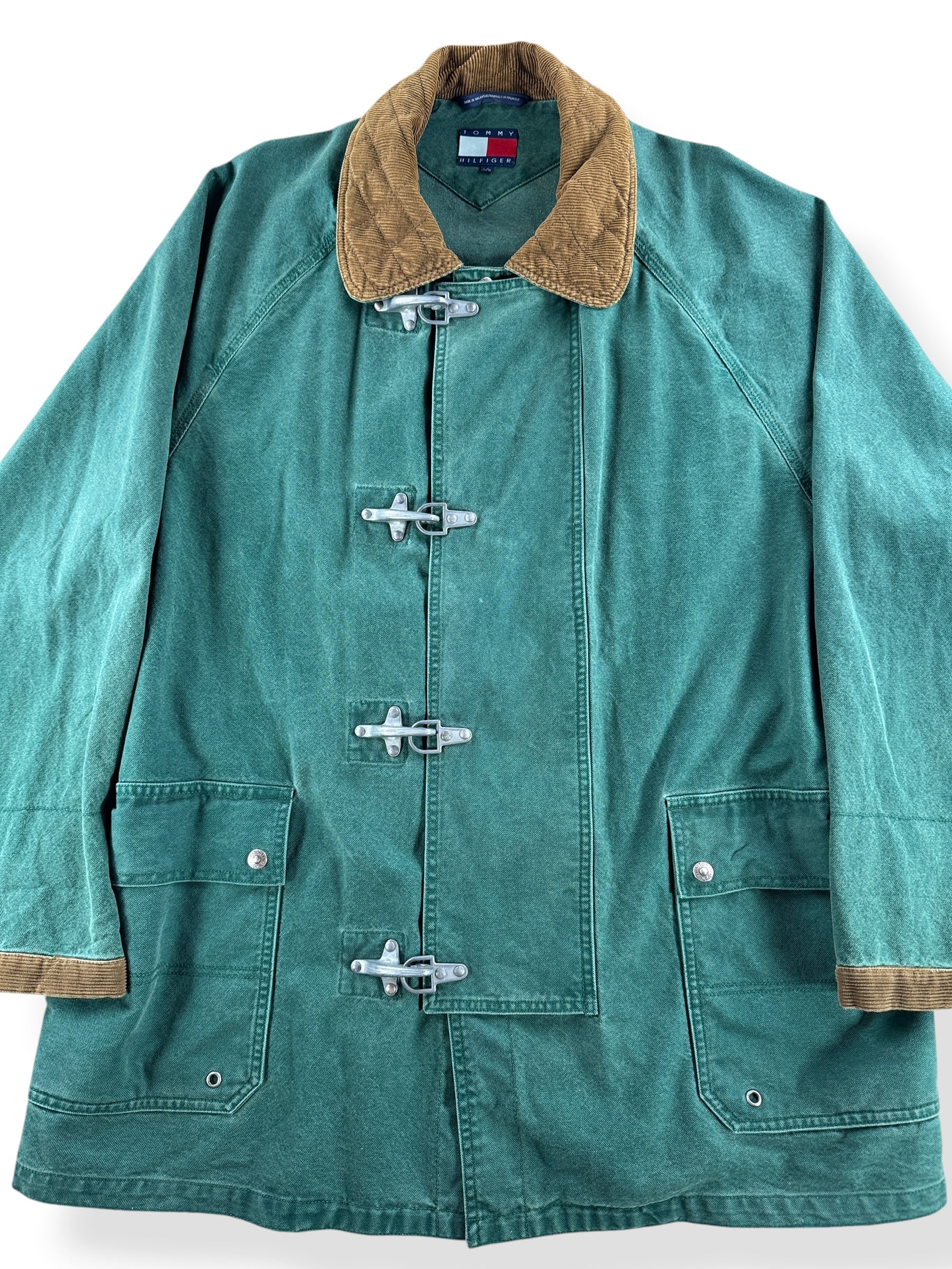Close up of Vintage Tommy Hilfiger Fireman Clasp Canvas Coat SZ L