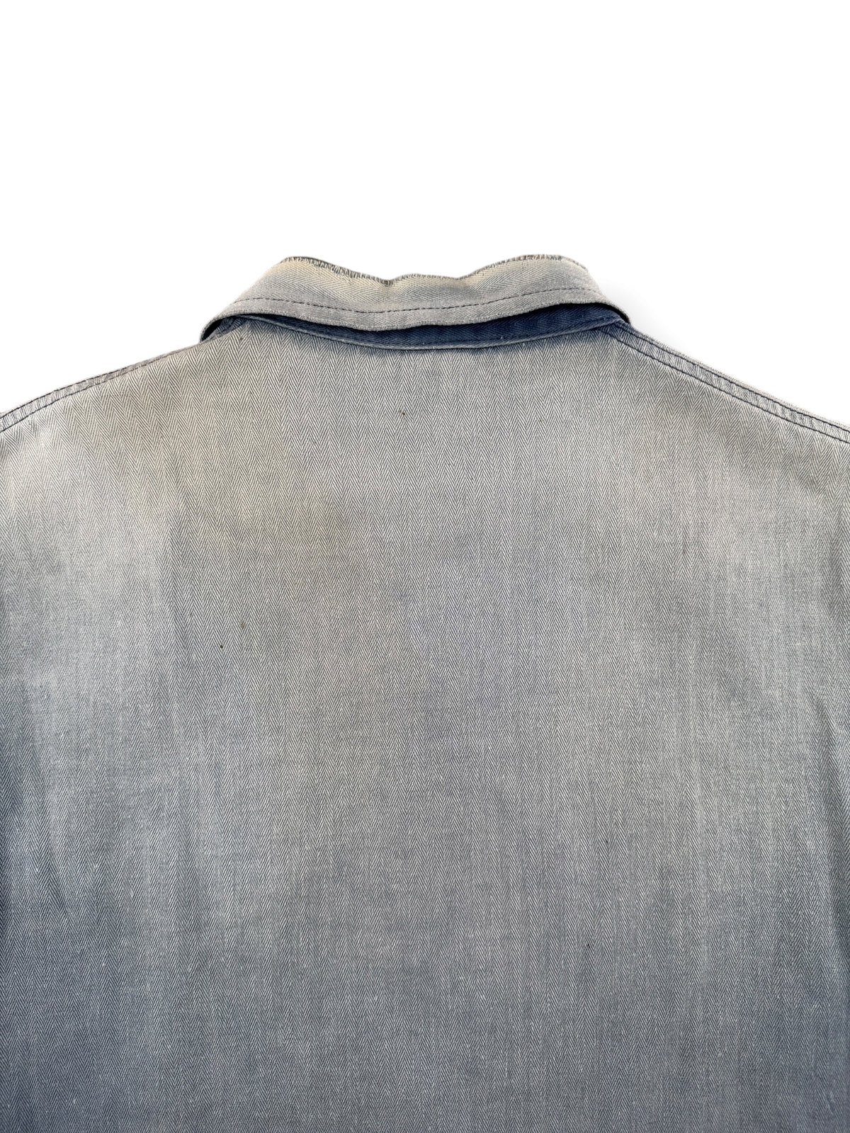 Fading on back of Vintage Distressed French Chore Coat SZ L