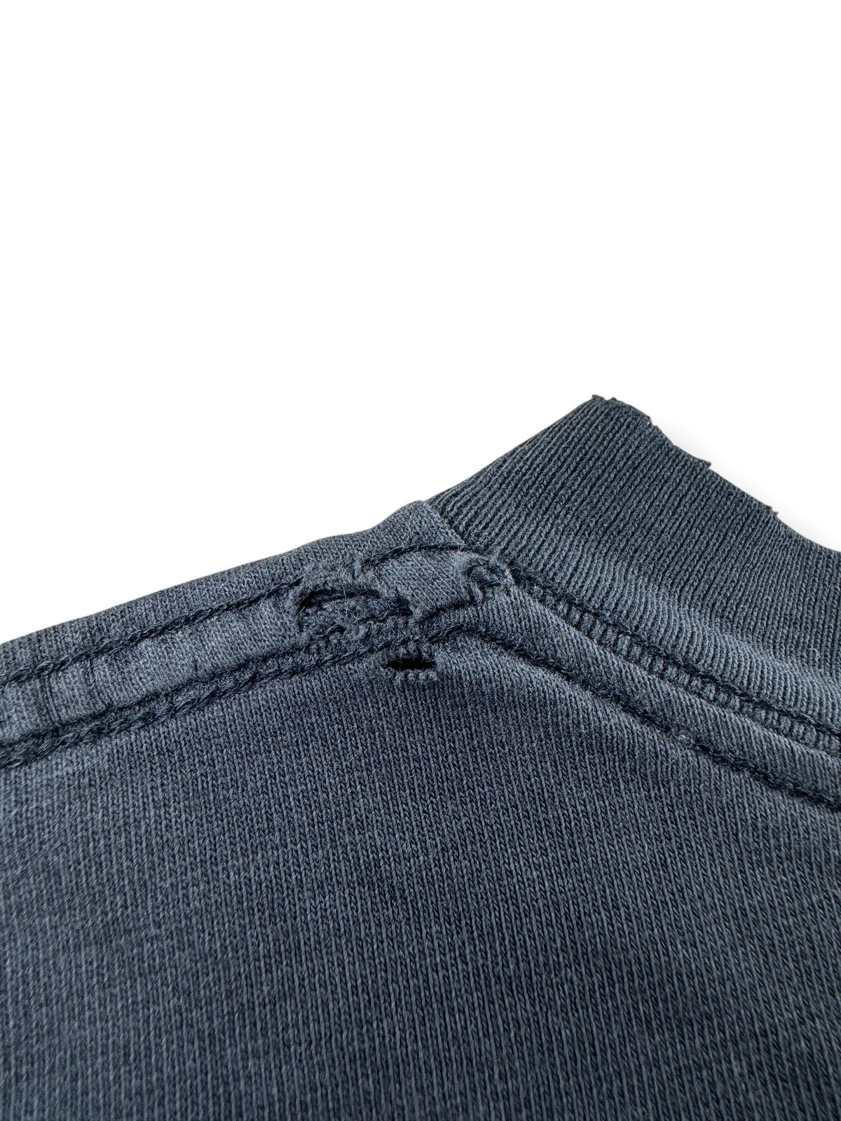 Ware near collar on the back of Vintage Black Blank Tee SZ XL