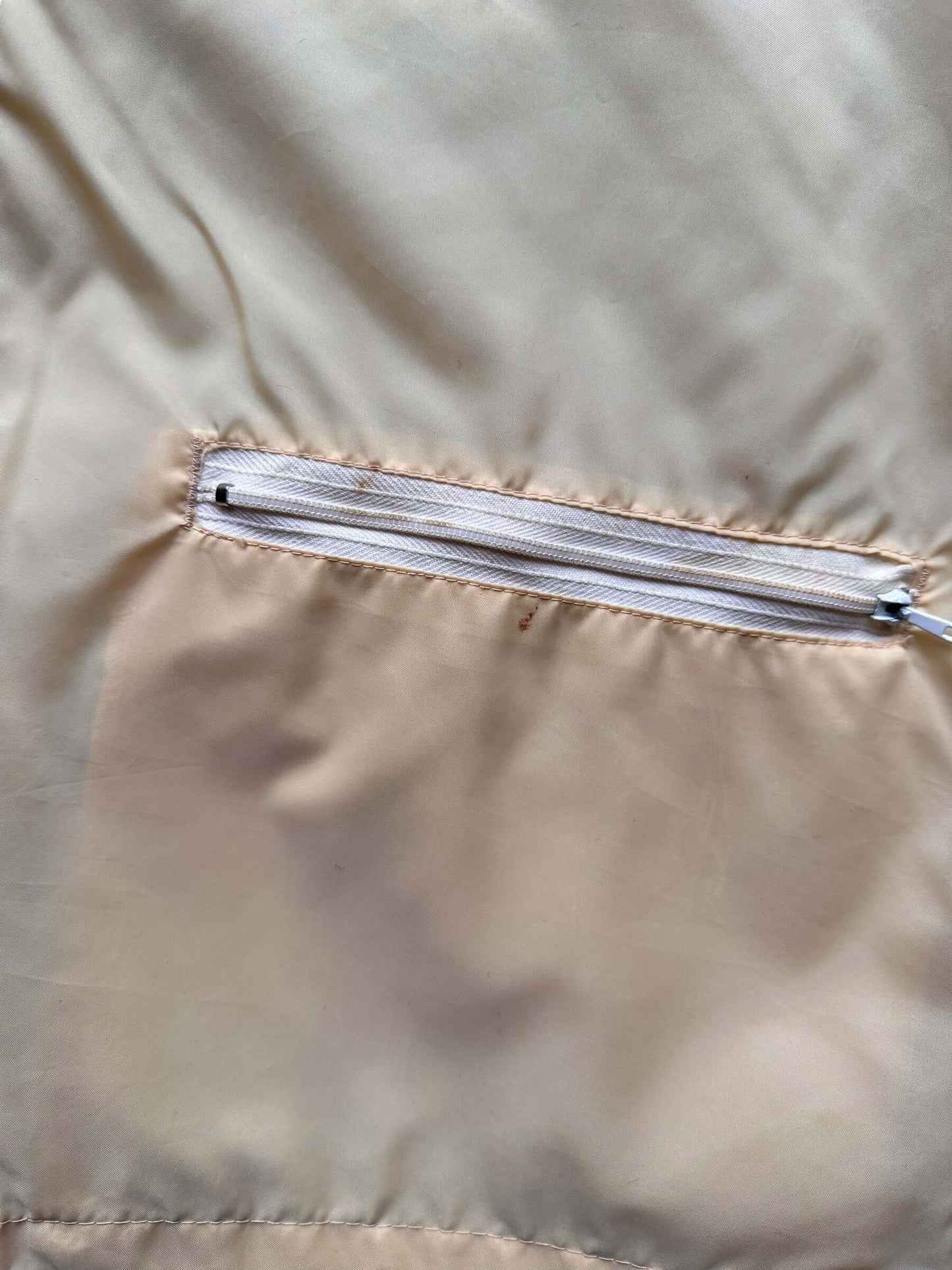 Slight Staining around pocket zippers on Vintage Made In Japan Surfer Nylon Jacket SZ M | Vintage Clothing Seattle