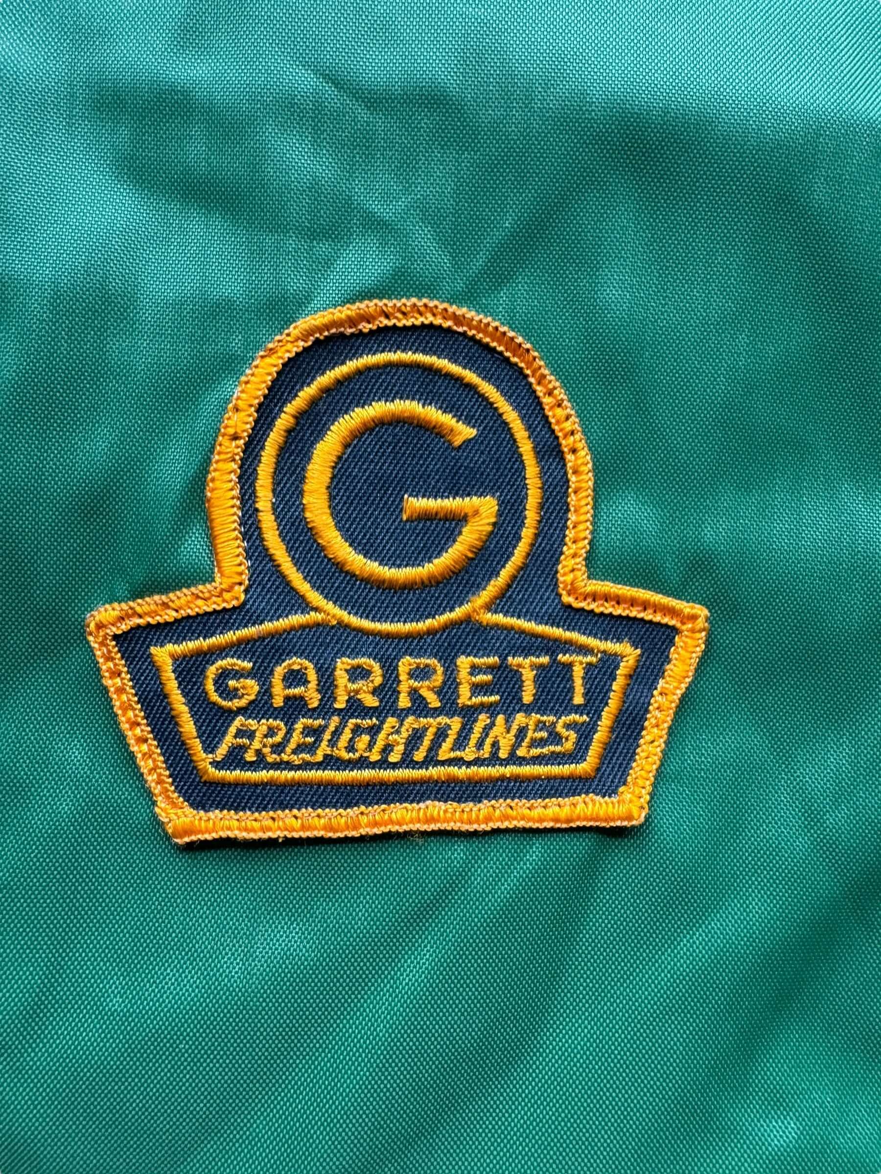 front patch of Vintage Garret Freightlines Windbreaker SZ XL