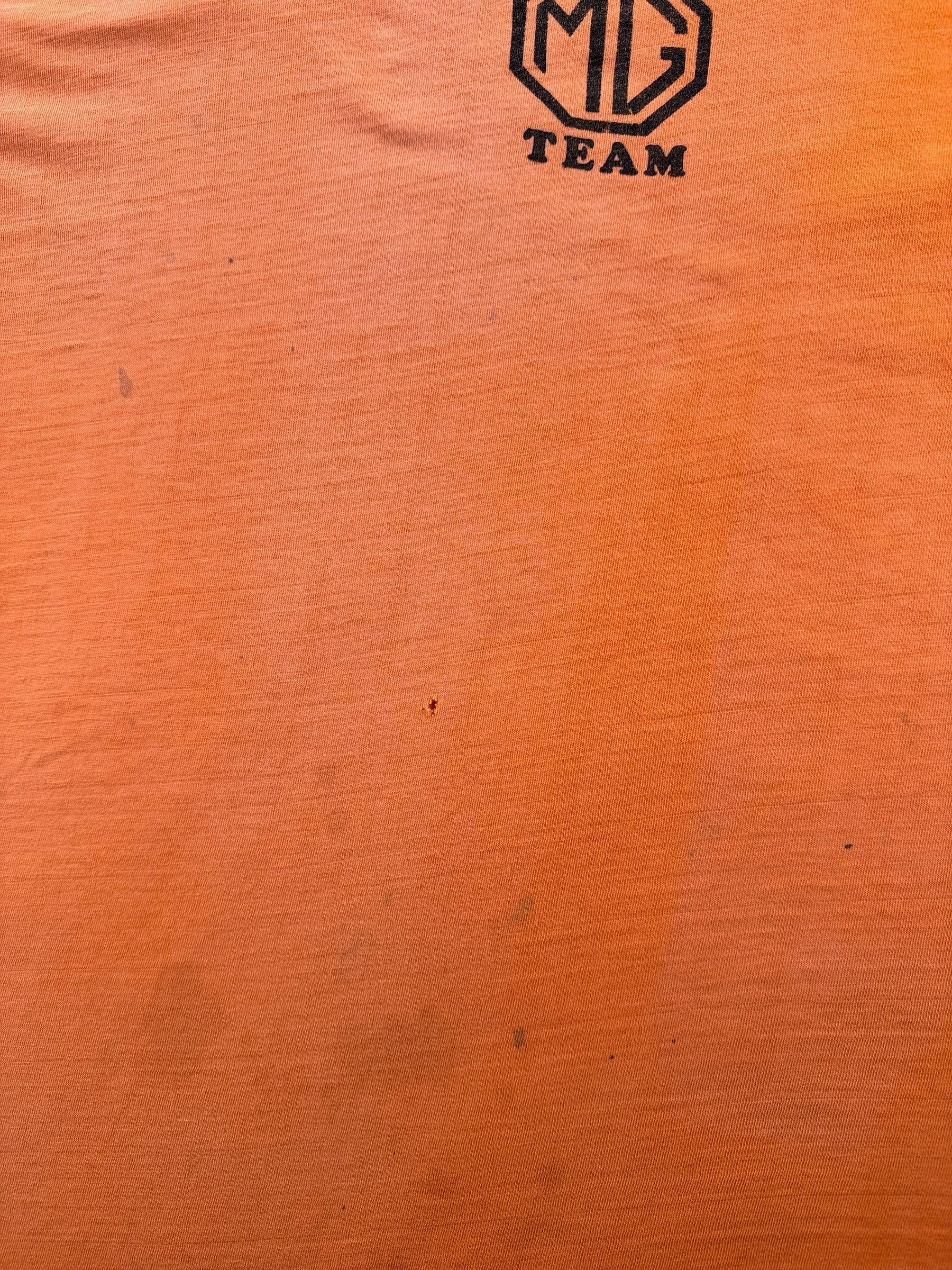 Stains on Vintage Raglan Cut Creamsicle Orange MG Rally Team Springfoot Tee SZ M