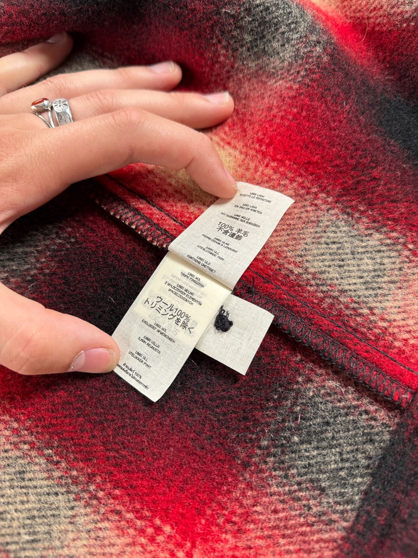Care tag on Filson Plaid Jac Shirt SZ S