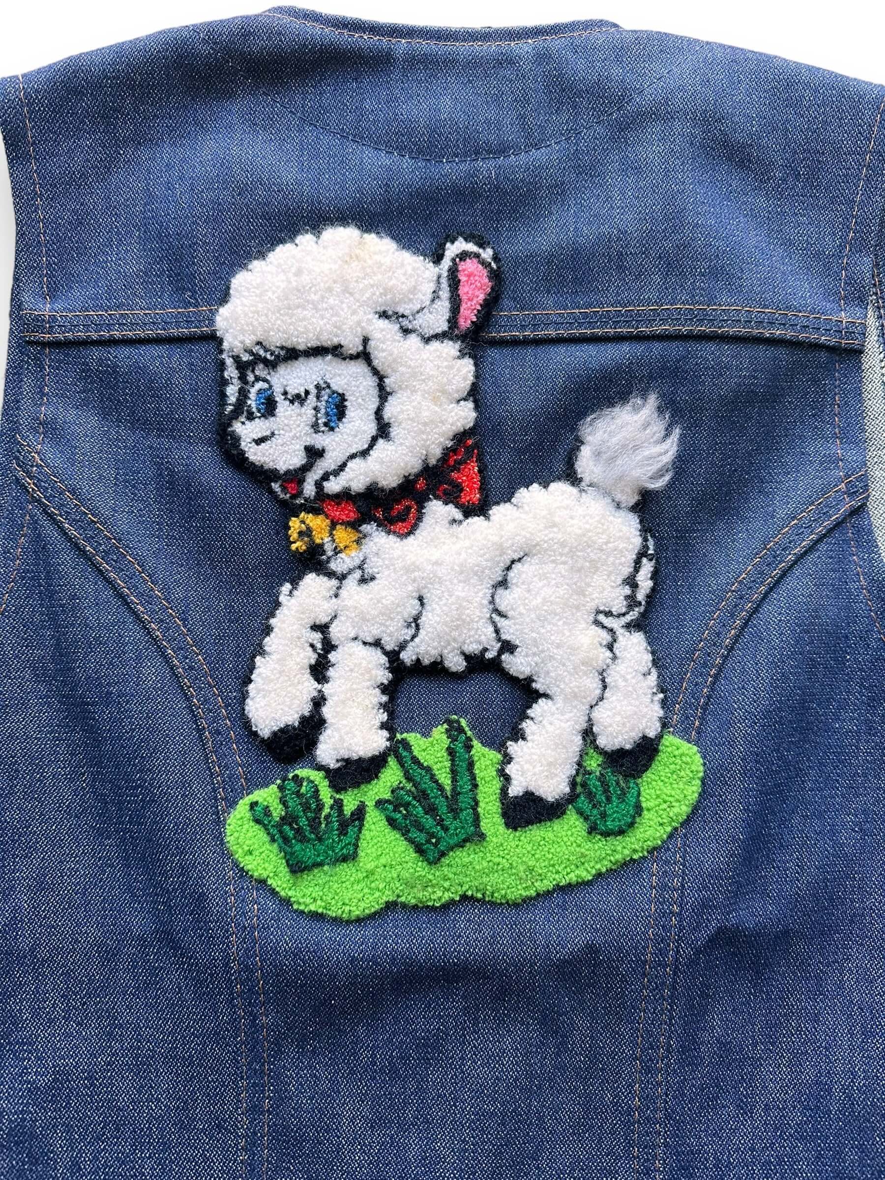 back close up of Vintage Wrangler Lamb Patch Denim Vest SZ S