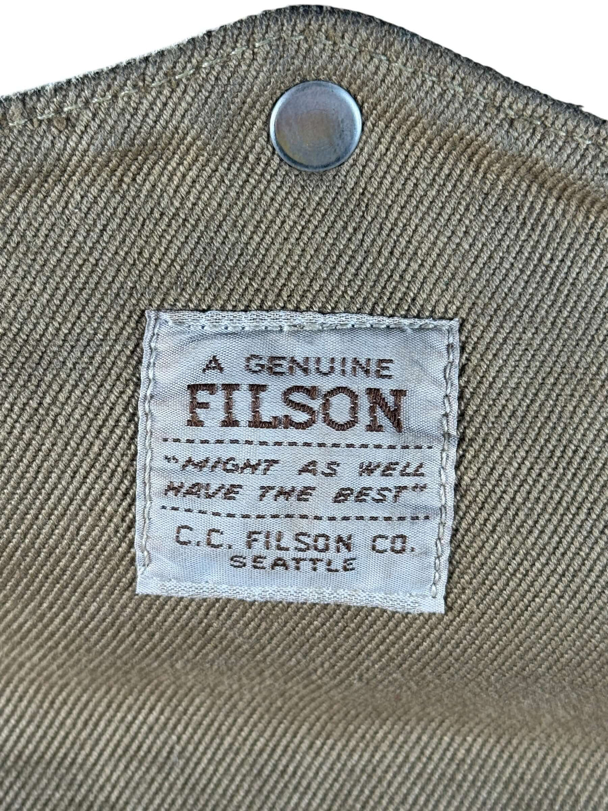 Filson brand tag on Filson Rugged Twill Briefcase Style 257