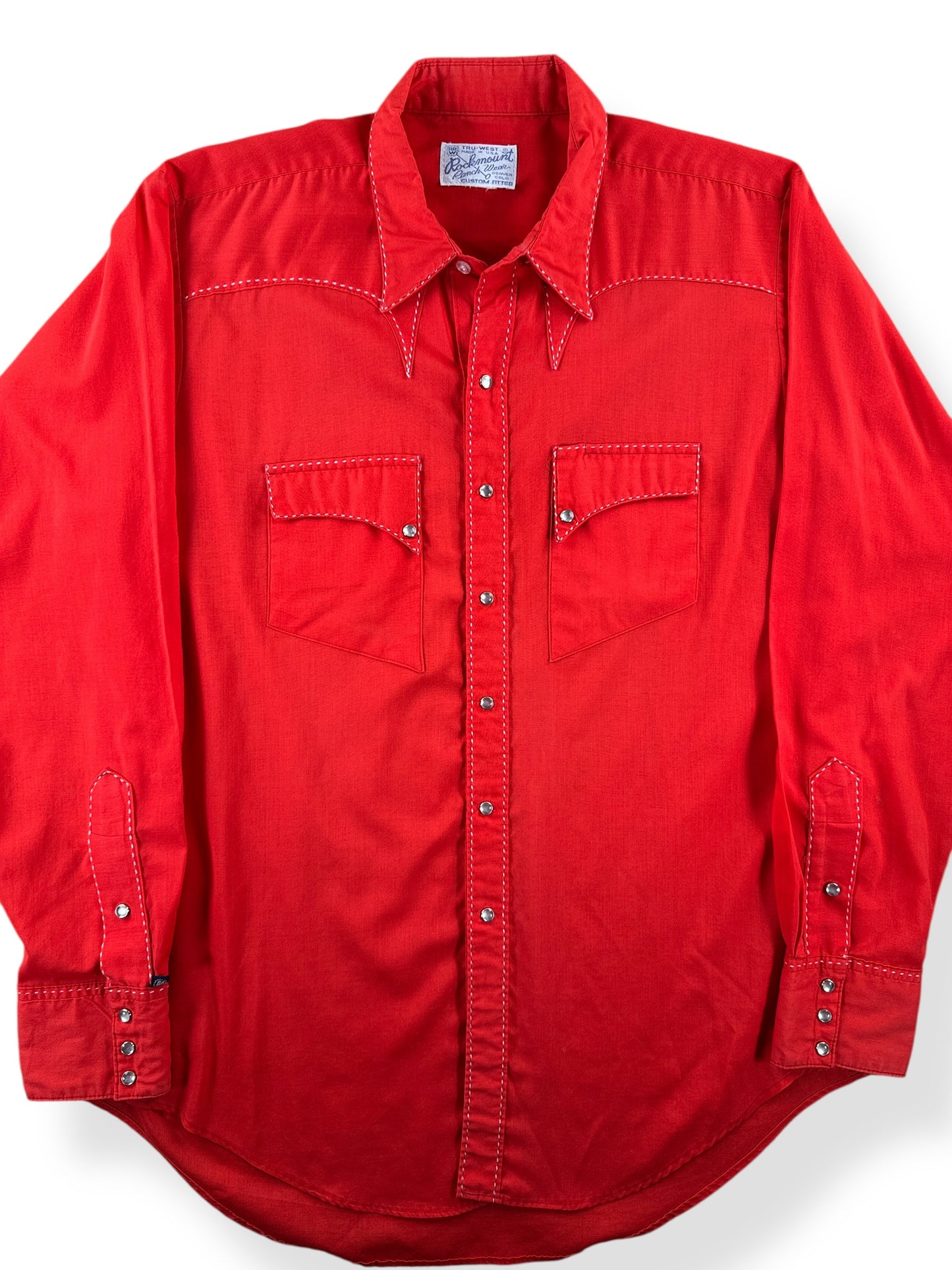 Front Close Up of Vintage Red Rockmount Western Wear Pearl Snap SZ L