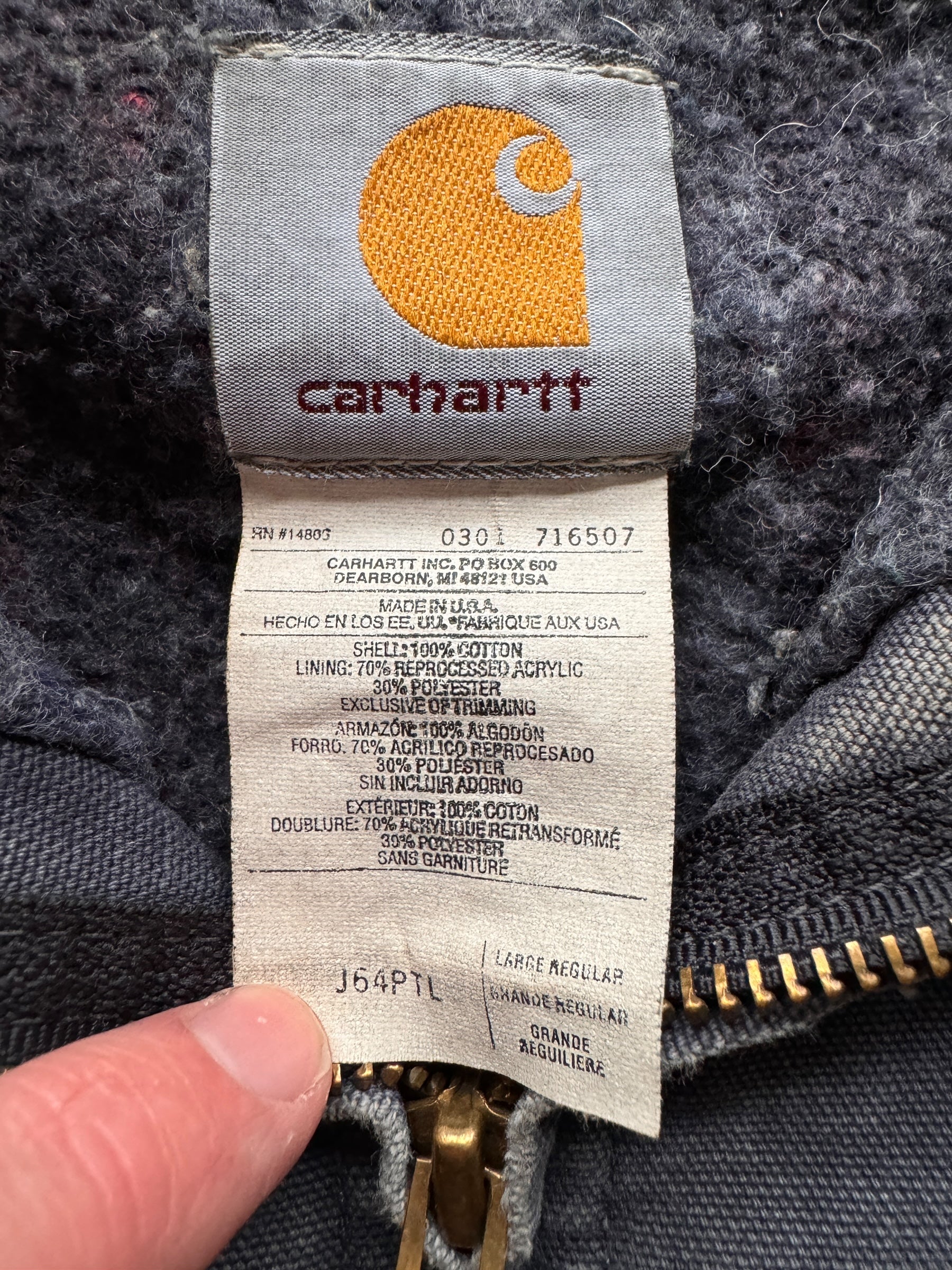 Tag on Vintage Thrashed Carhartt J64PTL Detroit Jacket SZ L