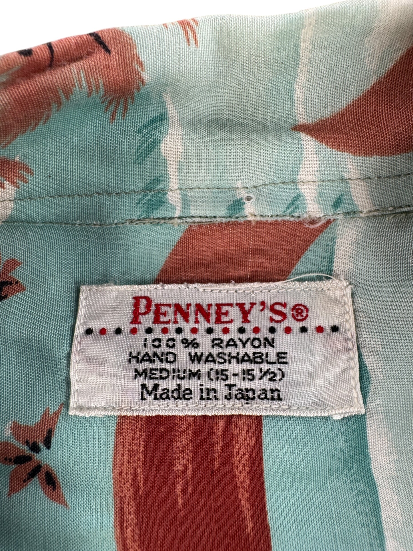 Label on Vintage Penney's Flowers & Waves Rayon Aloha Shirt SZ M