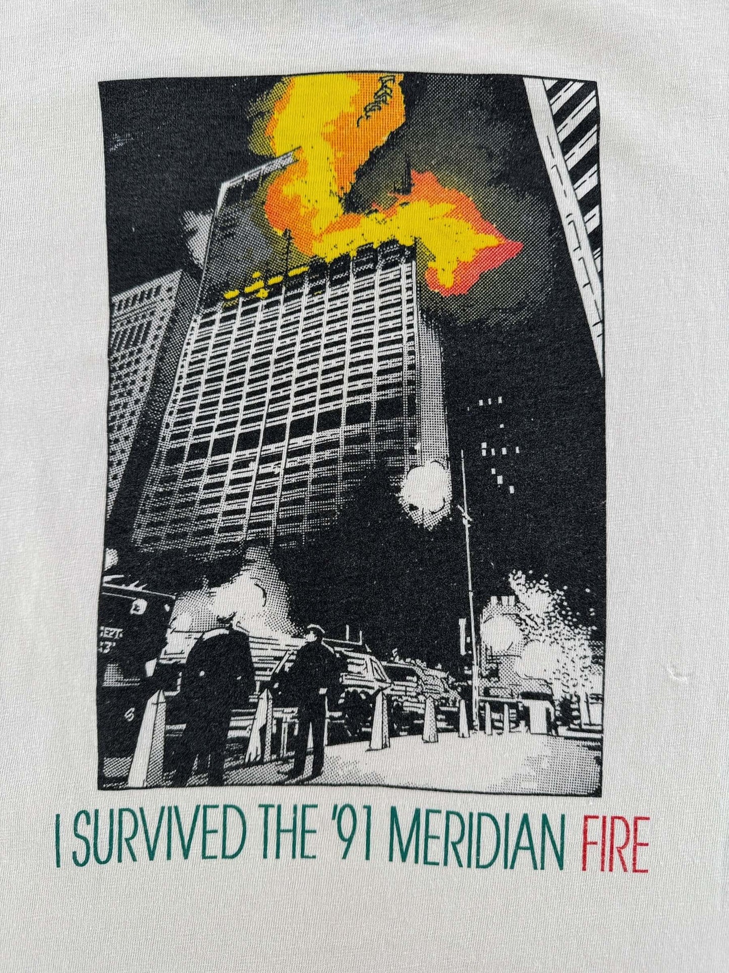 Back Graphic of Vintage Comcast I Survived The '91 Meridian Fire Tee SZ L