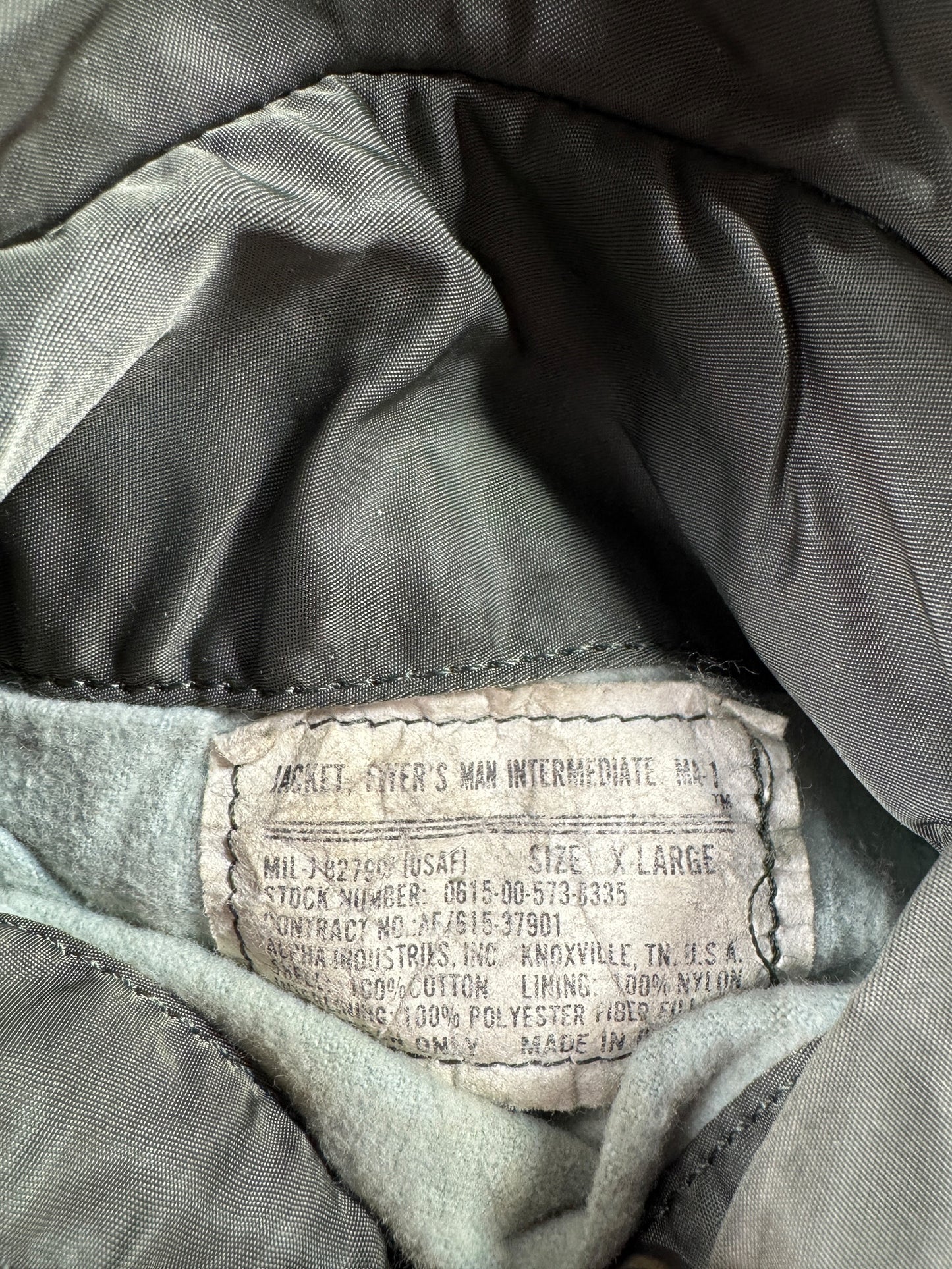 Label on Vintage Alpha Industries Vietnam Era MA1 Bomber Jacket SZ