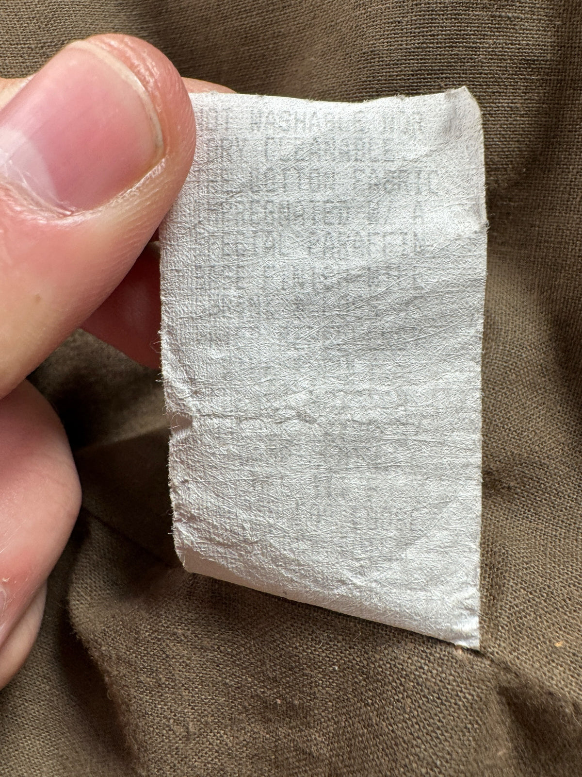 Back of info tag on Filson 2000s Era Tin Cloth 1493N Jacket SZ L