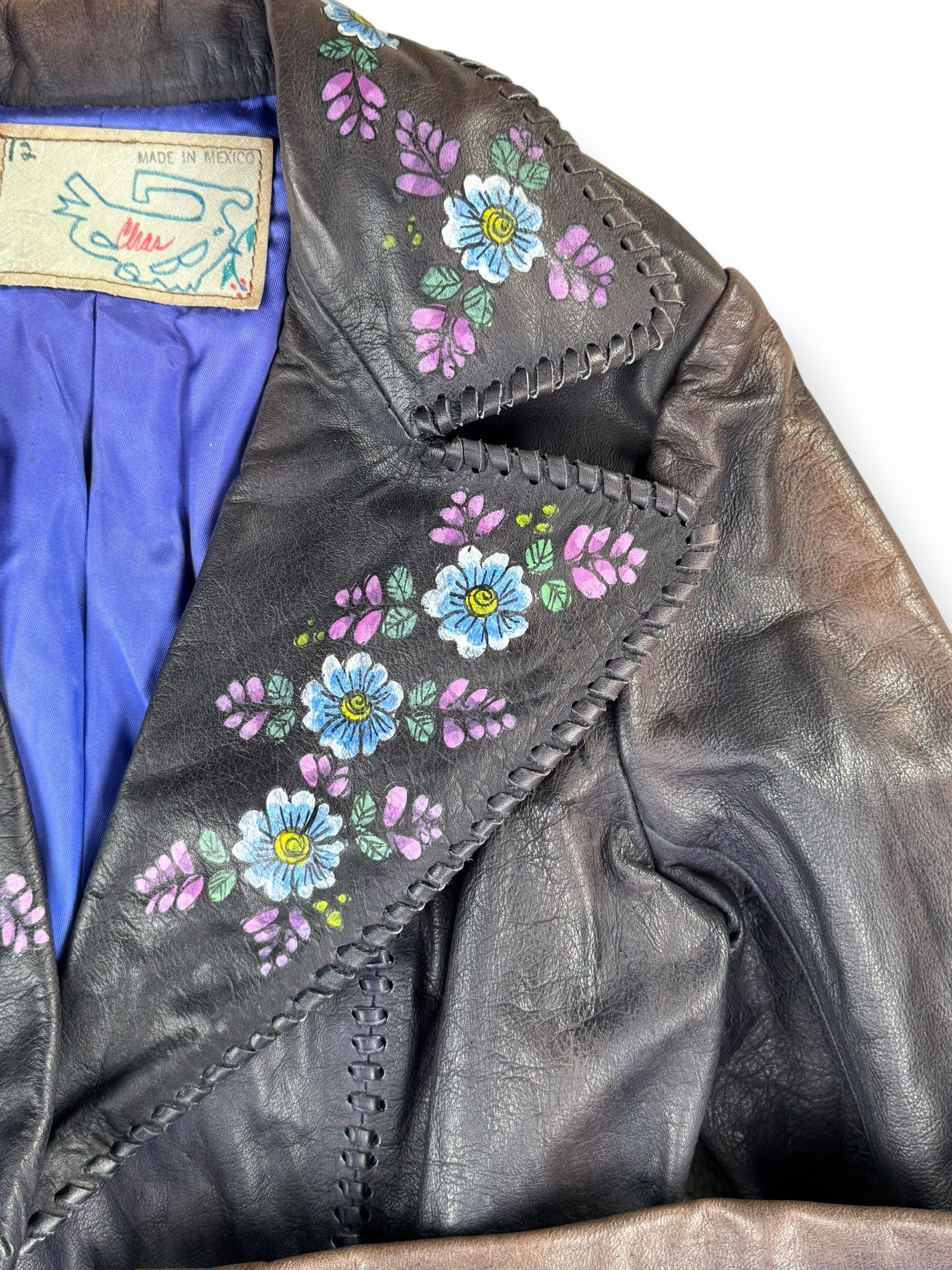 Lapel view of 1970s Char Mexican Hand Painted Leather Jacket M-L