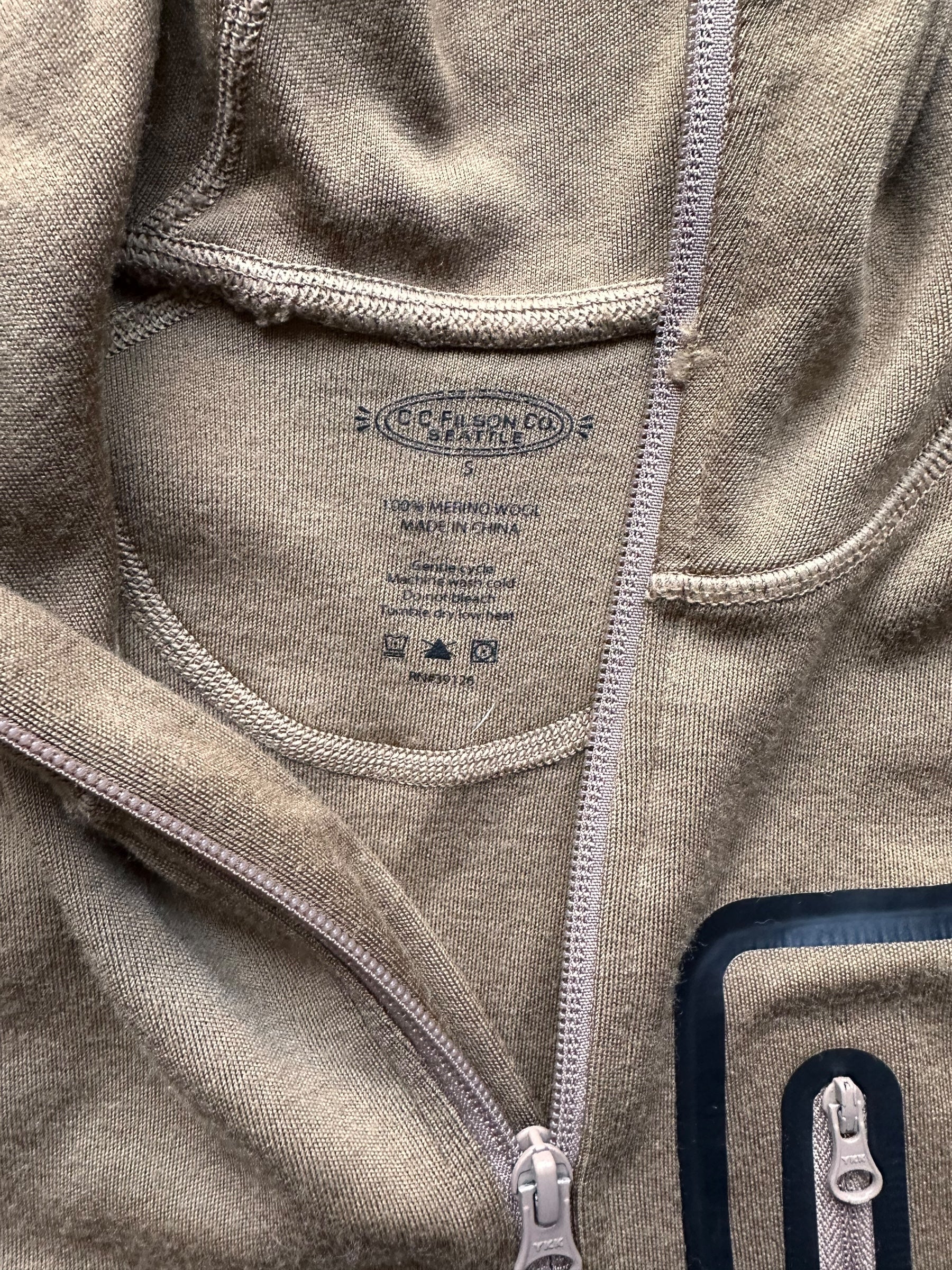 Production/Sizing Tag on Filson 400G Merino Wool Zip Up Hoodie SZ M |  Barn Owl Vintage Goods | Filson Bargain Outlet Seattle