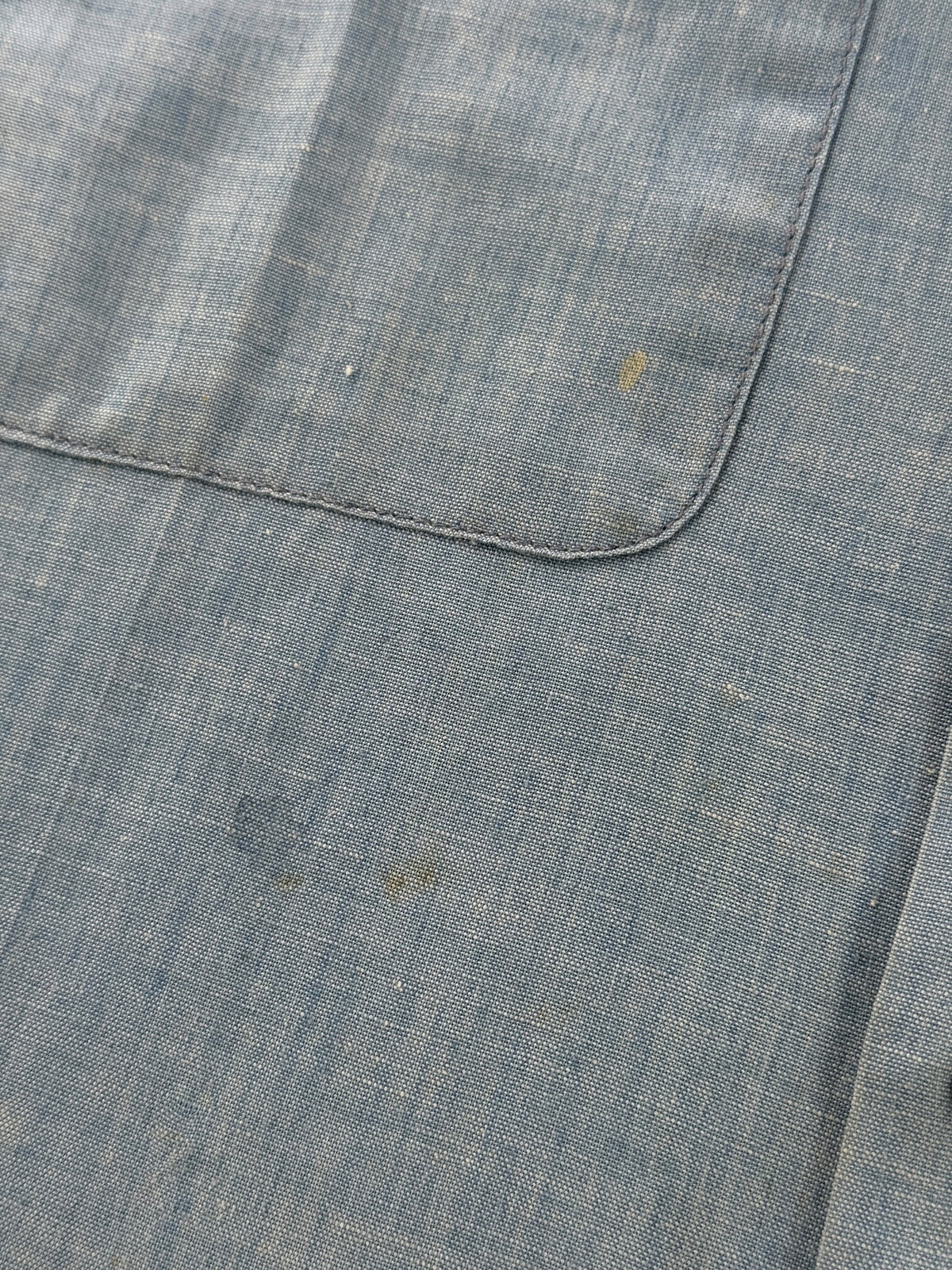 Small stains on front of Vintage Stenciled Chambray Shirt SZ M
