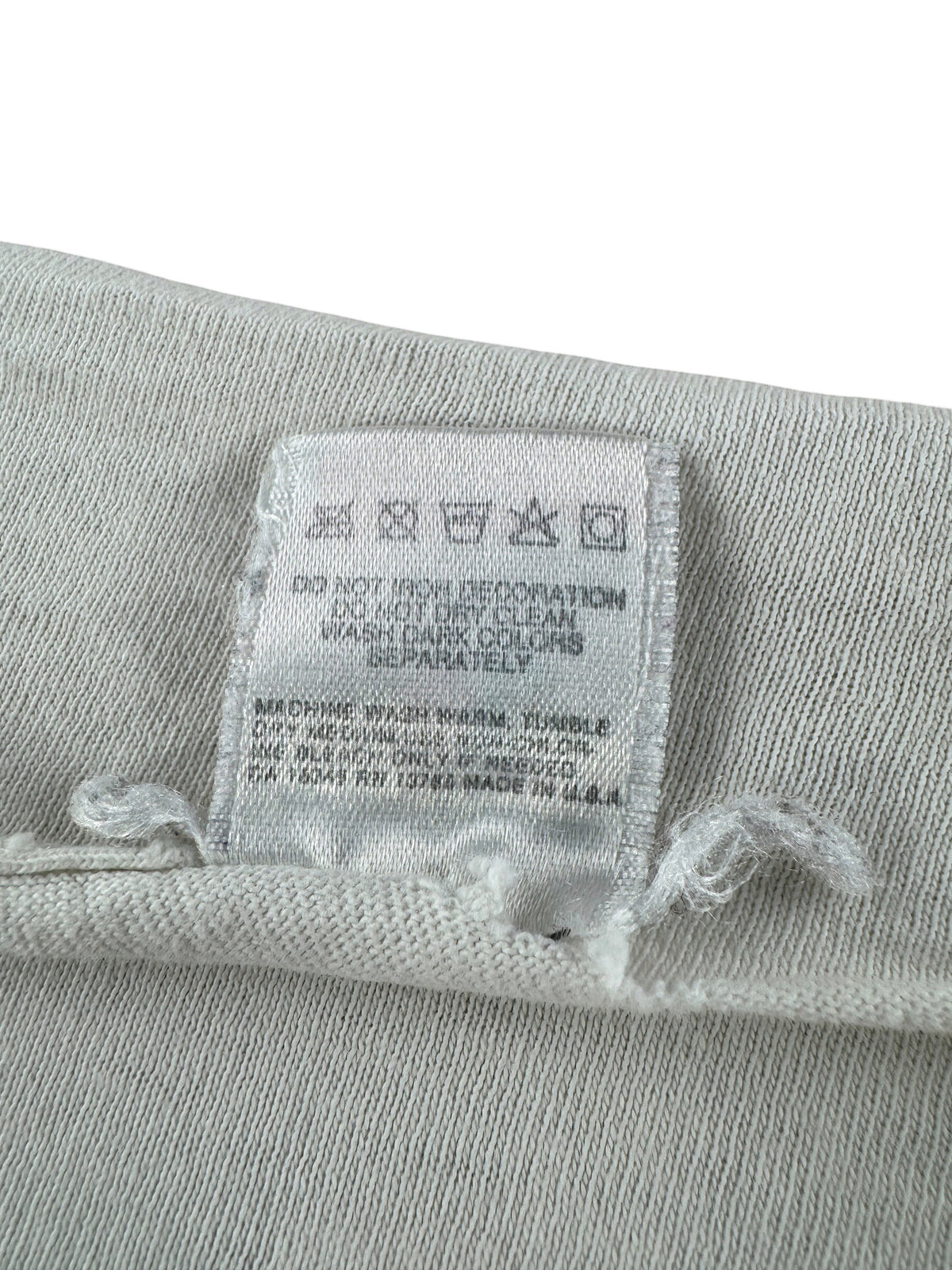 Back of tag Vintage Thrashed Give Racism The Boot Timberland Tee SZ XL