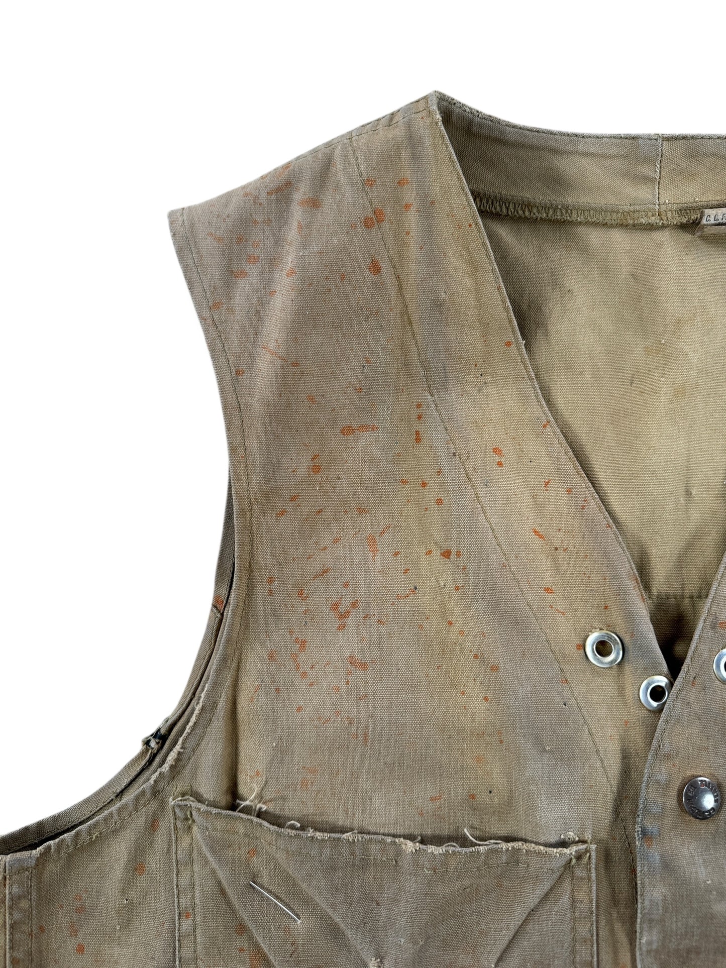 Stains on Vintage Filson Tin Hunting Vest Button Sample SZ 40