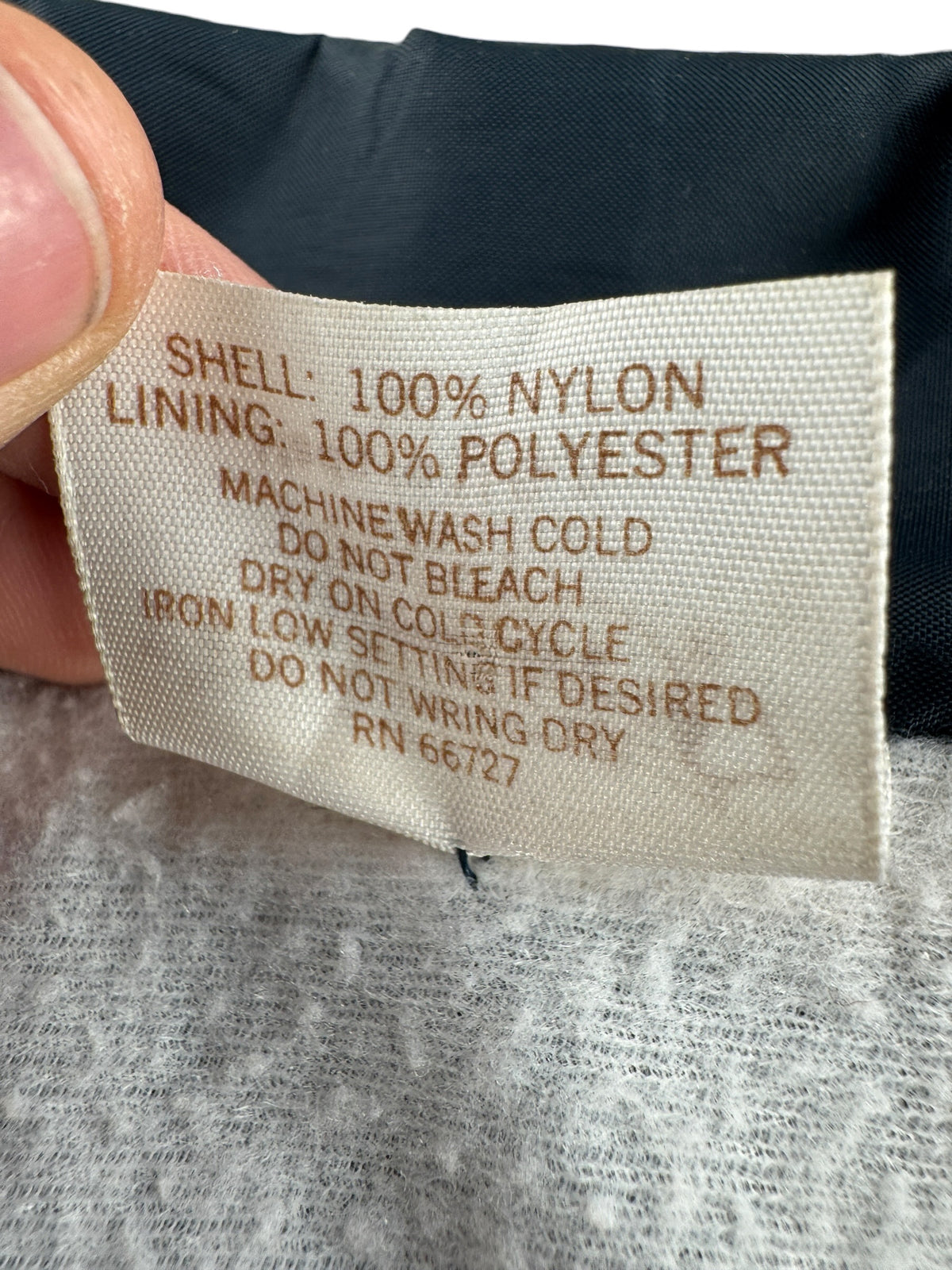 Back of tag on Vintage Champion Spark Plug Windbreaker SZ XL