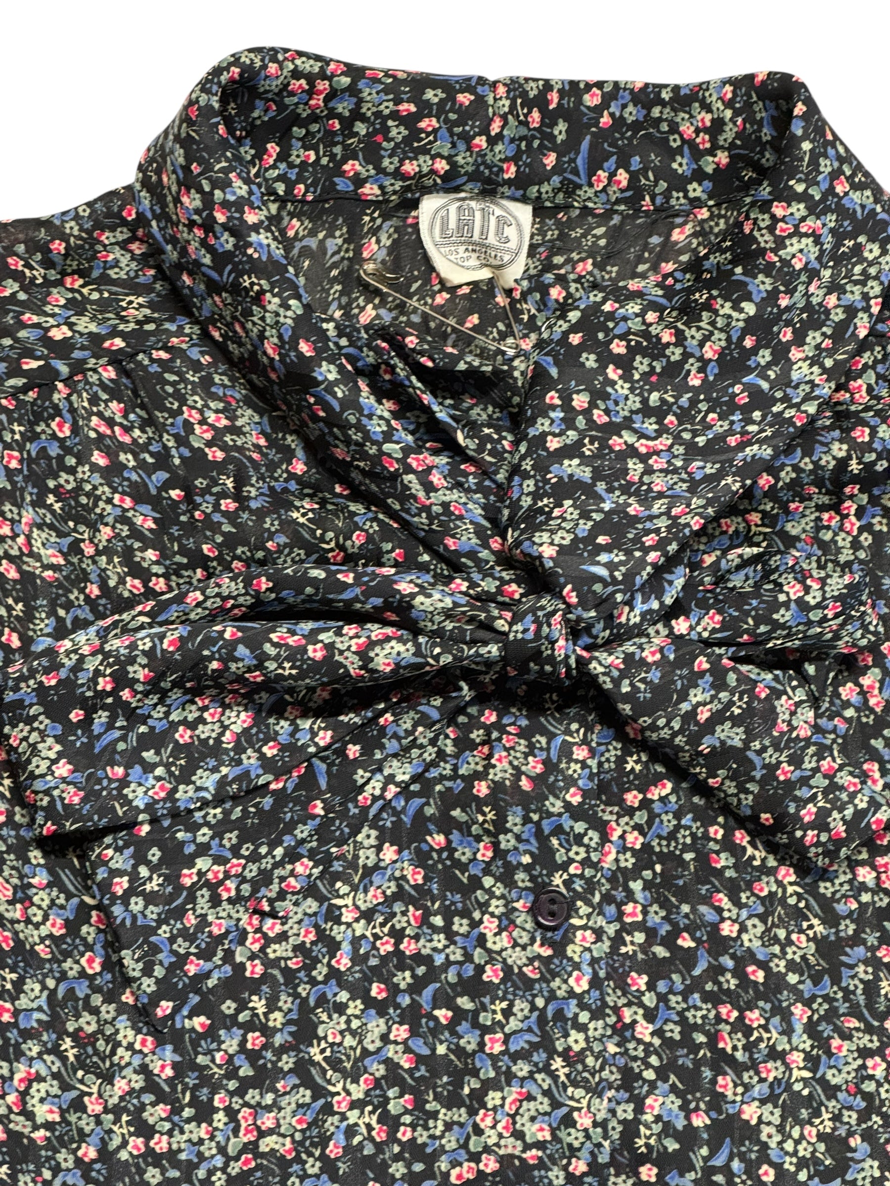 Tag view of 1980s LATC Floral Button Up L