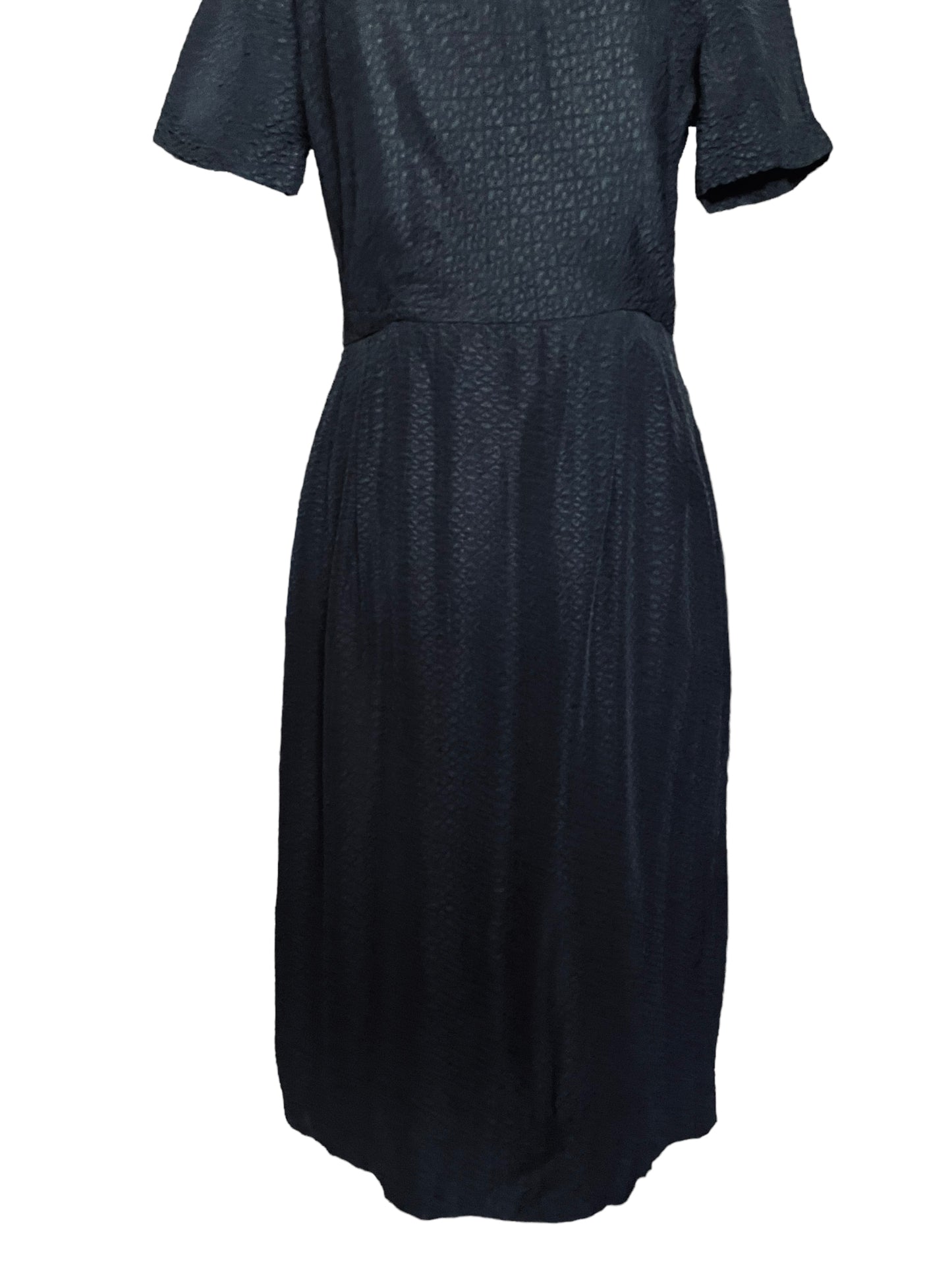 Front skirt view of Vintage 1950s Black Textured Dress by Parkshire |  Barn Owl Vintage | Seattle Vintage Dresses