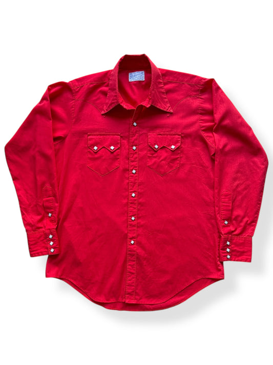 Front of Vintage Rockmount Western Wear Red pearl Snap SZ L