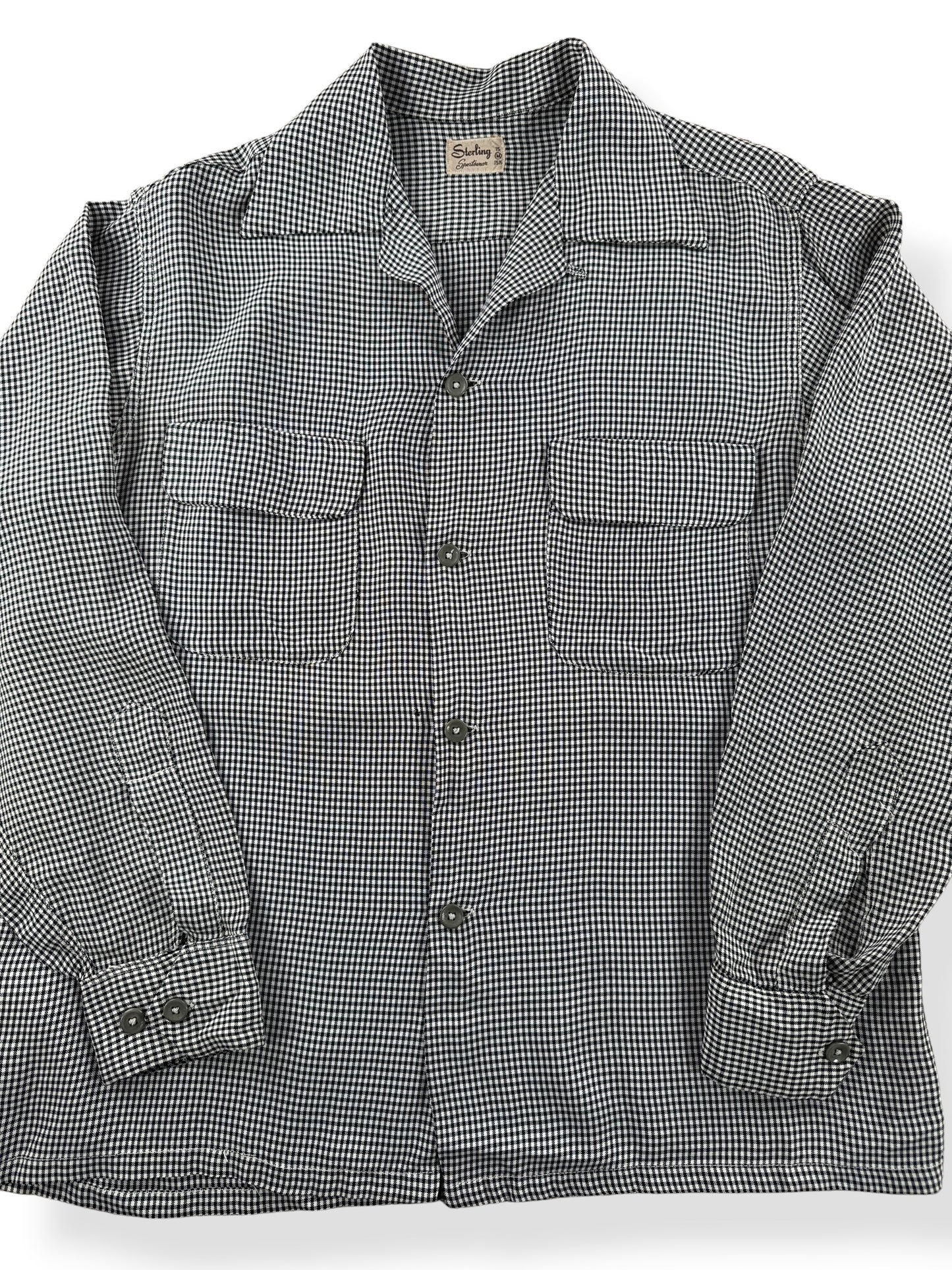 Close-up of Vintage 1950s Sterling Black and White Rayon Loop Collar Shirt SZ M